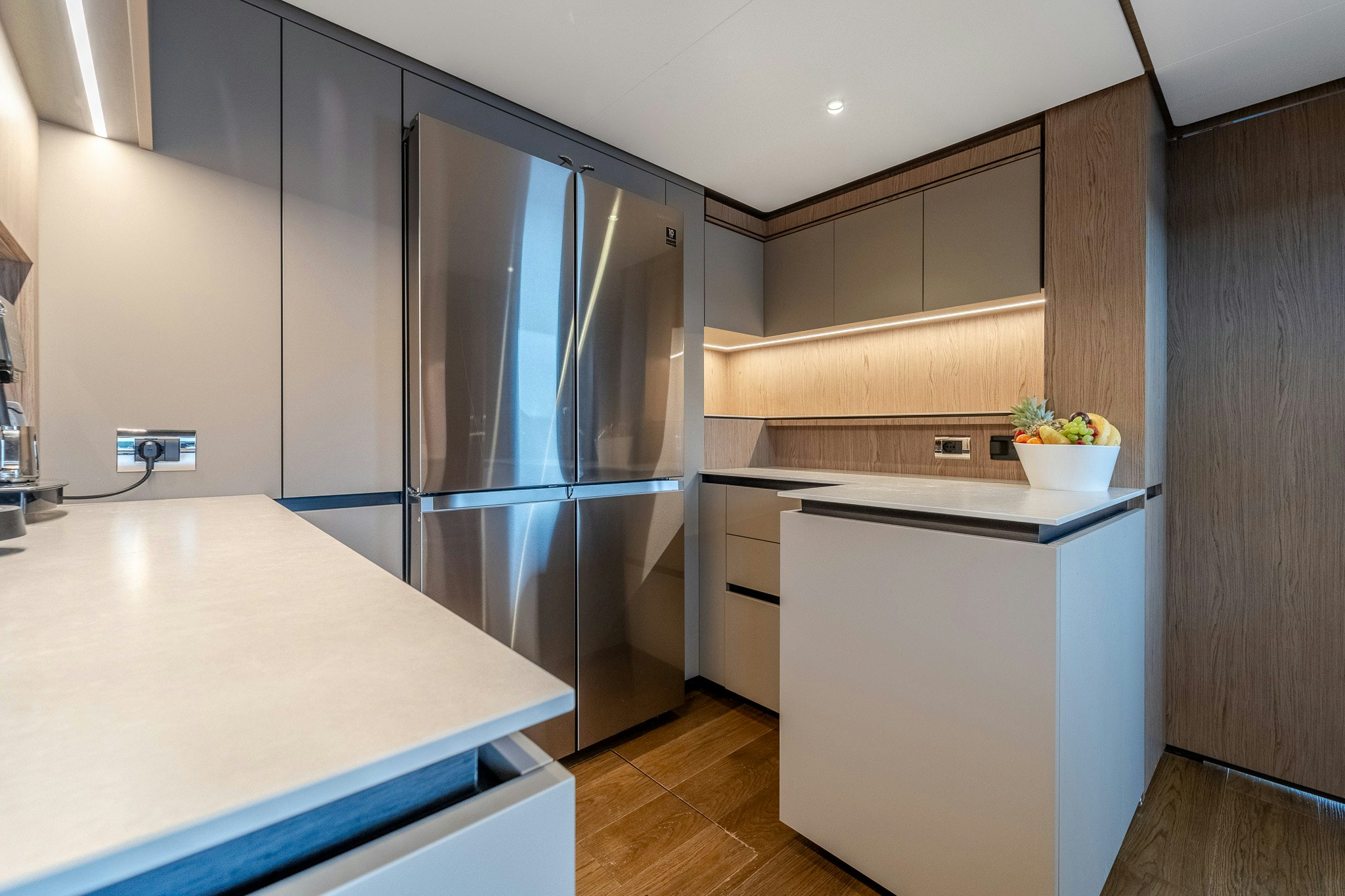 a kitchen with a refrigerator aboard ISOTTA Yacht for Sale