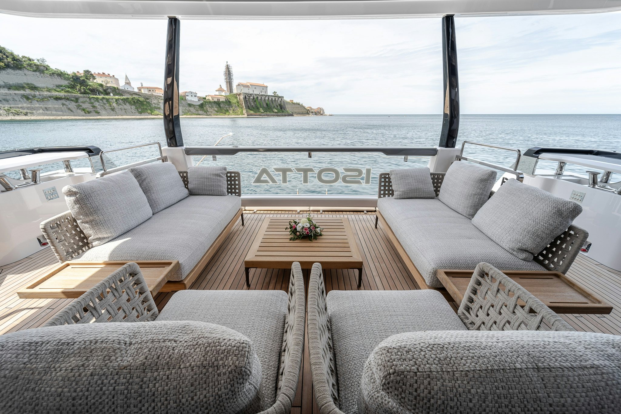a living room with a large body of water aboard ISOTTA Yacht for Sale