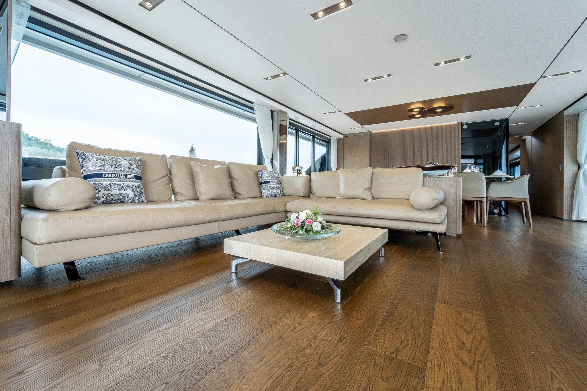 a living room with a couch and a table aboard ISOTTA Yacht for Sale