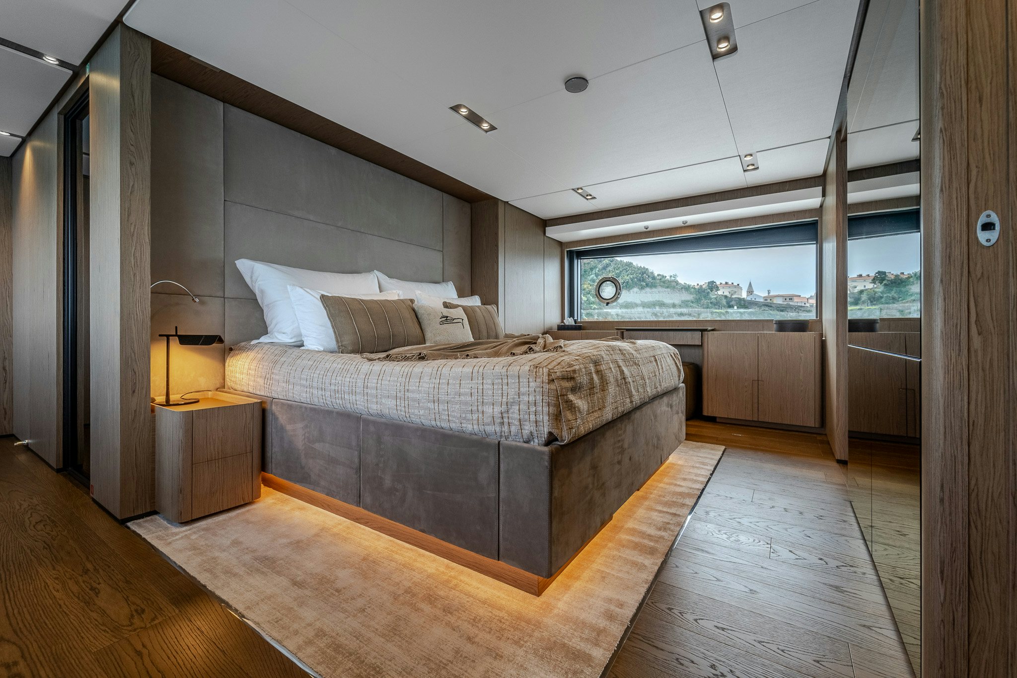 a bedroom with a large bed aboard ISOTTA Yacht for Sale