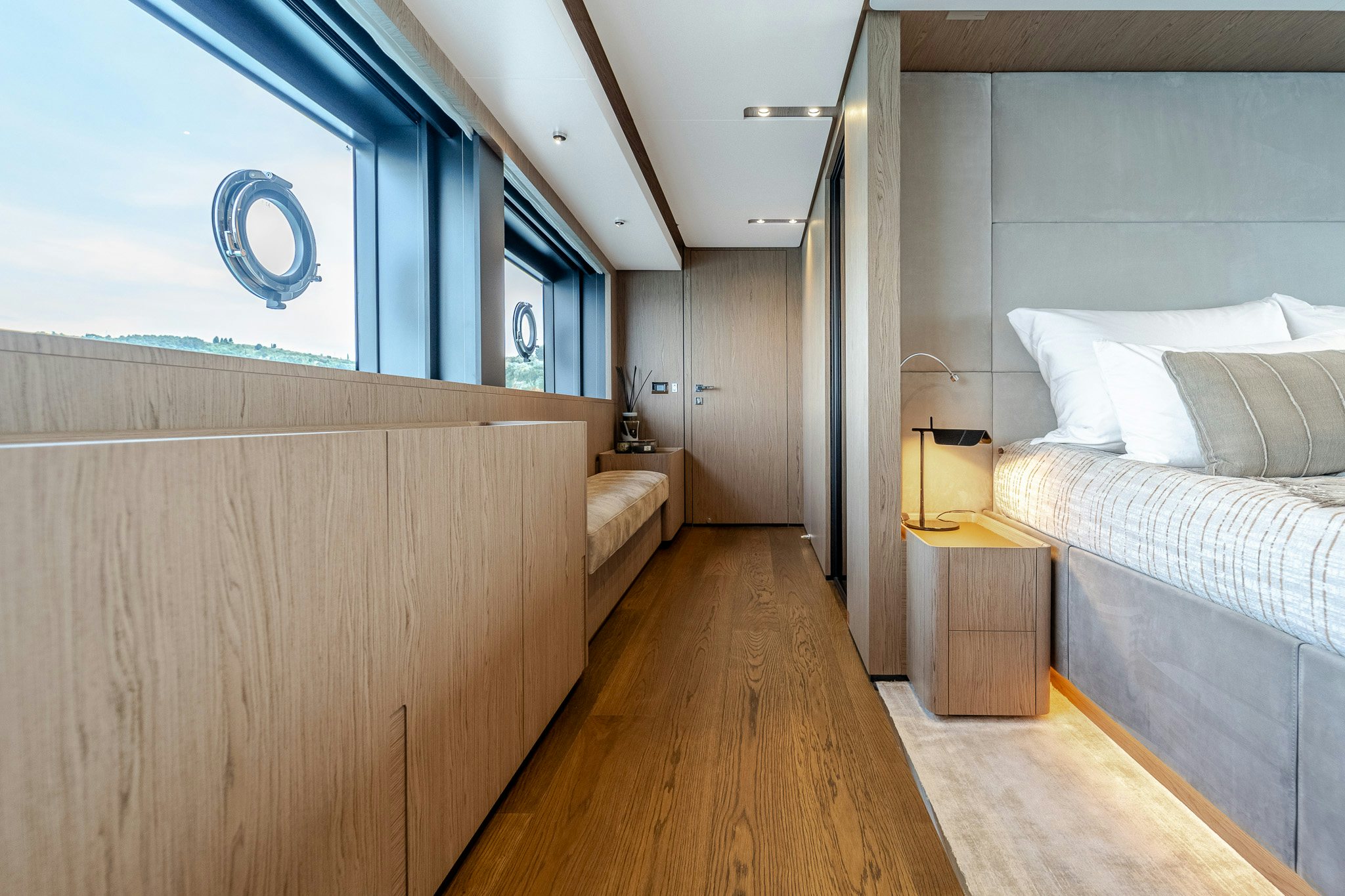 a room with a bed and a desk aboard ISOTTA Yacht for Sale