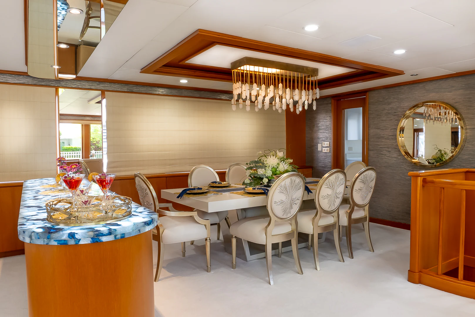 a large room with tables and chairs aboard GALE WINDS Yacht for Charter