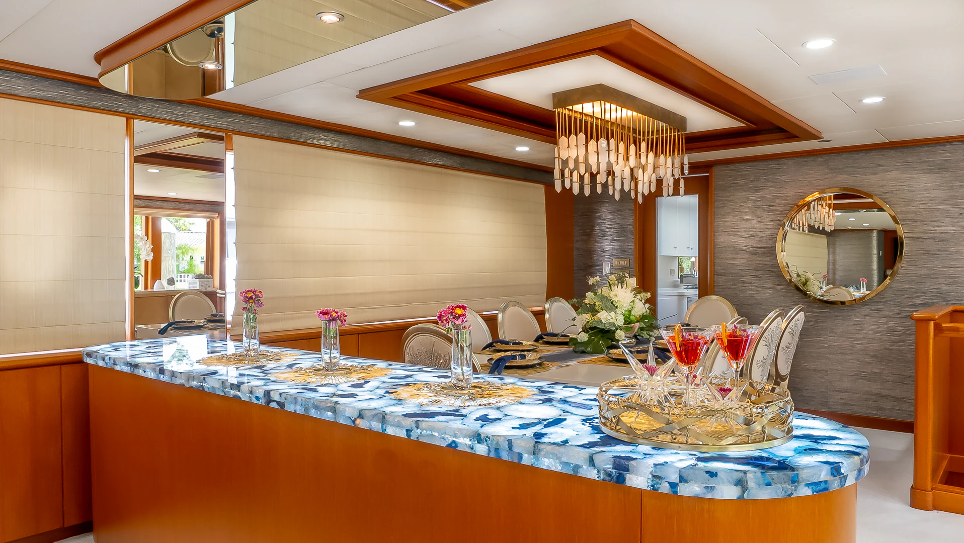 a large kitchen with a large table aboard GALE WINDS Yacht for Charter