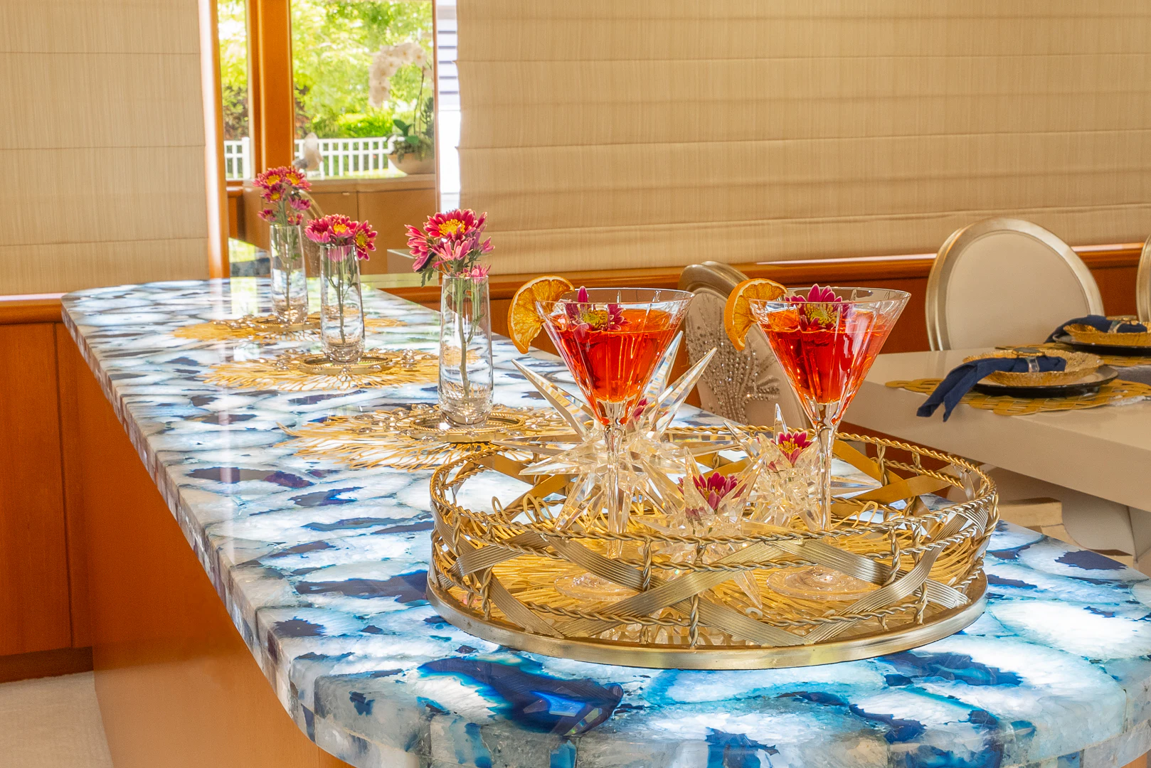 a table with a vase of flowers aboard GALE WINDS Yacht for Charter