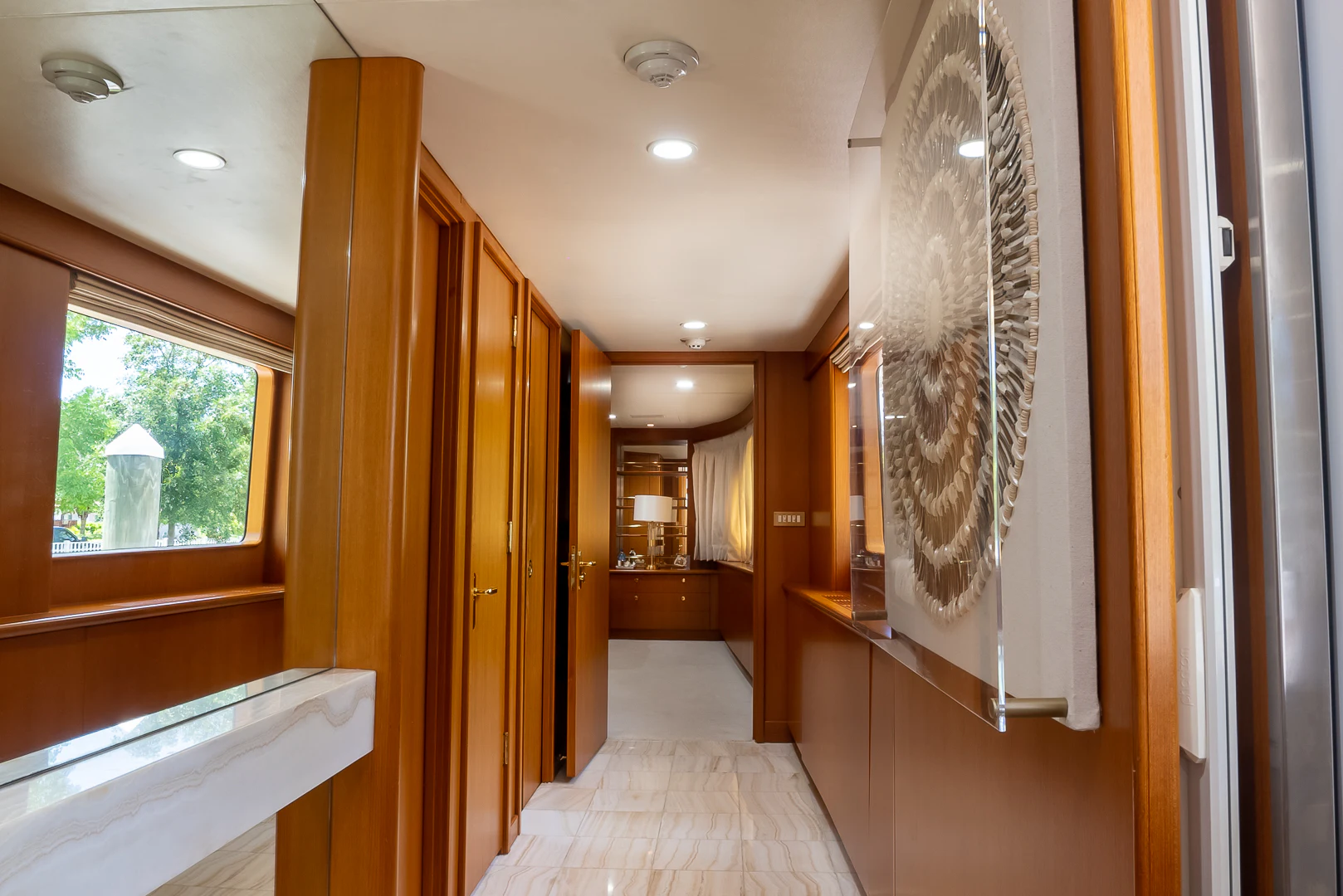 a hallway with wood doors aboard GALE WINDS Yacht for Charter