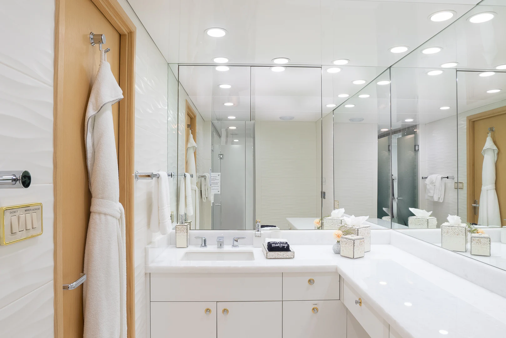 a bathroom with a large mirror aboard GALE WINDS Yacht for Charter