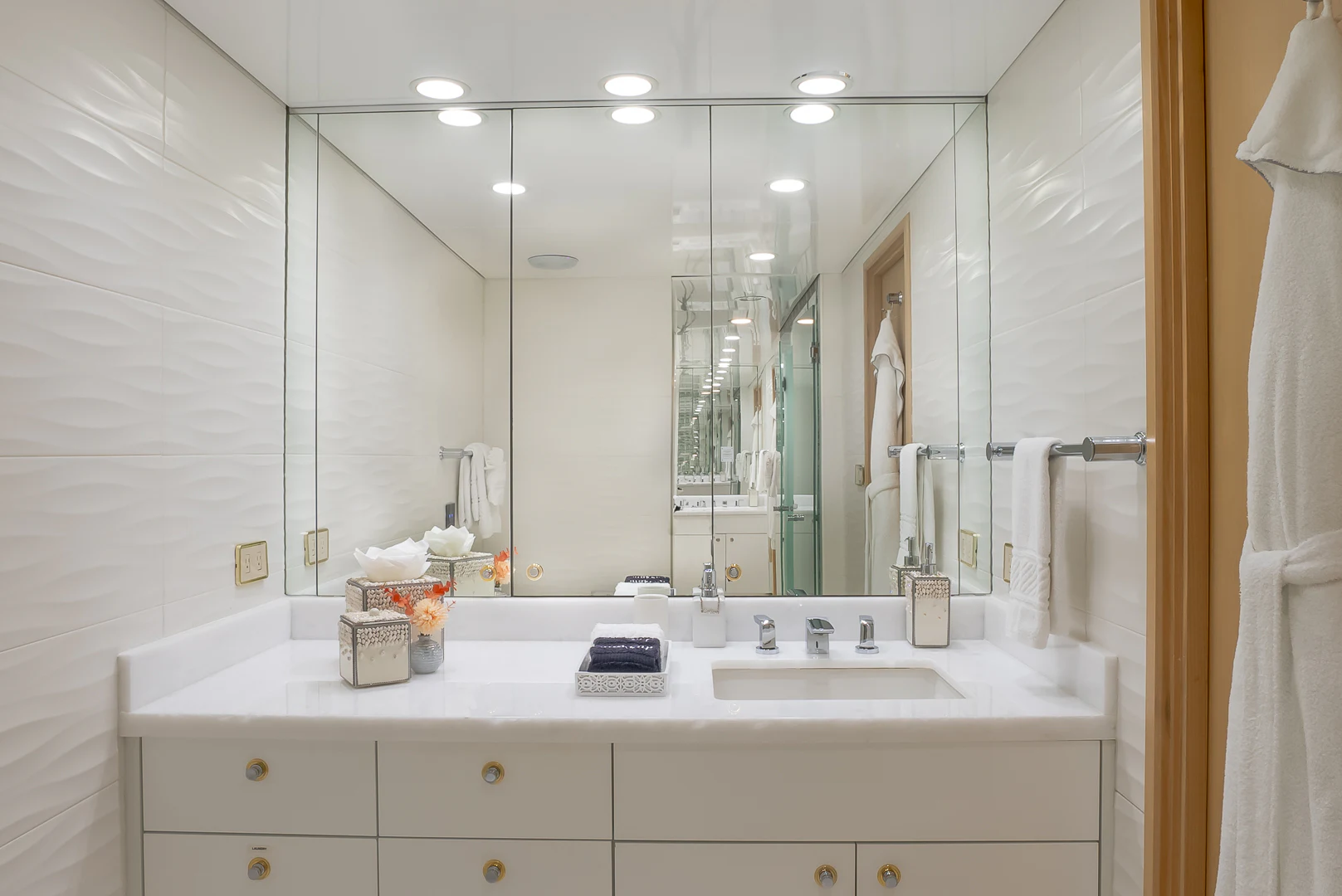 a bathroom with a large mirror aboard GALE WINDS Yacht for Charter