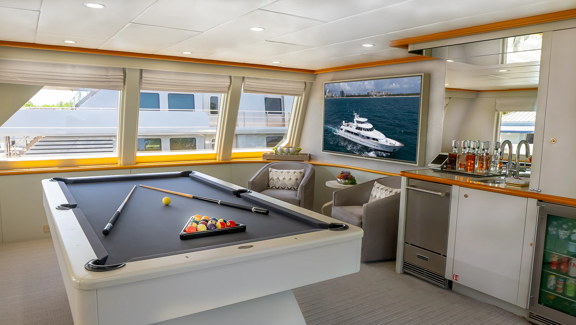a large kitchen with a large window aboard GALE WINDS Yacht for Charter