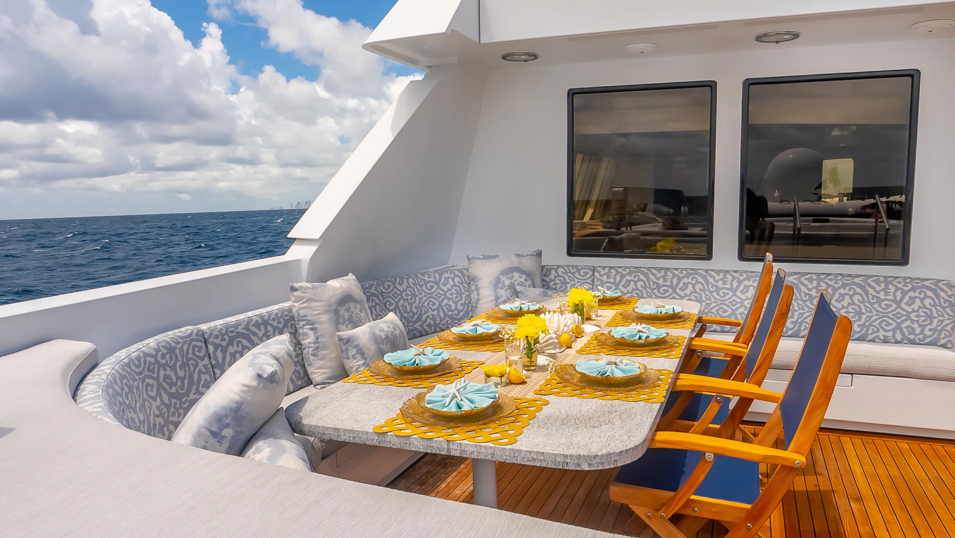 a table set for a meal on a boat aboard GALE WINDS Yacht for Charter