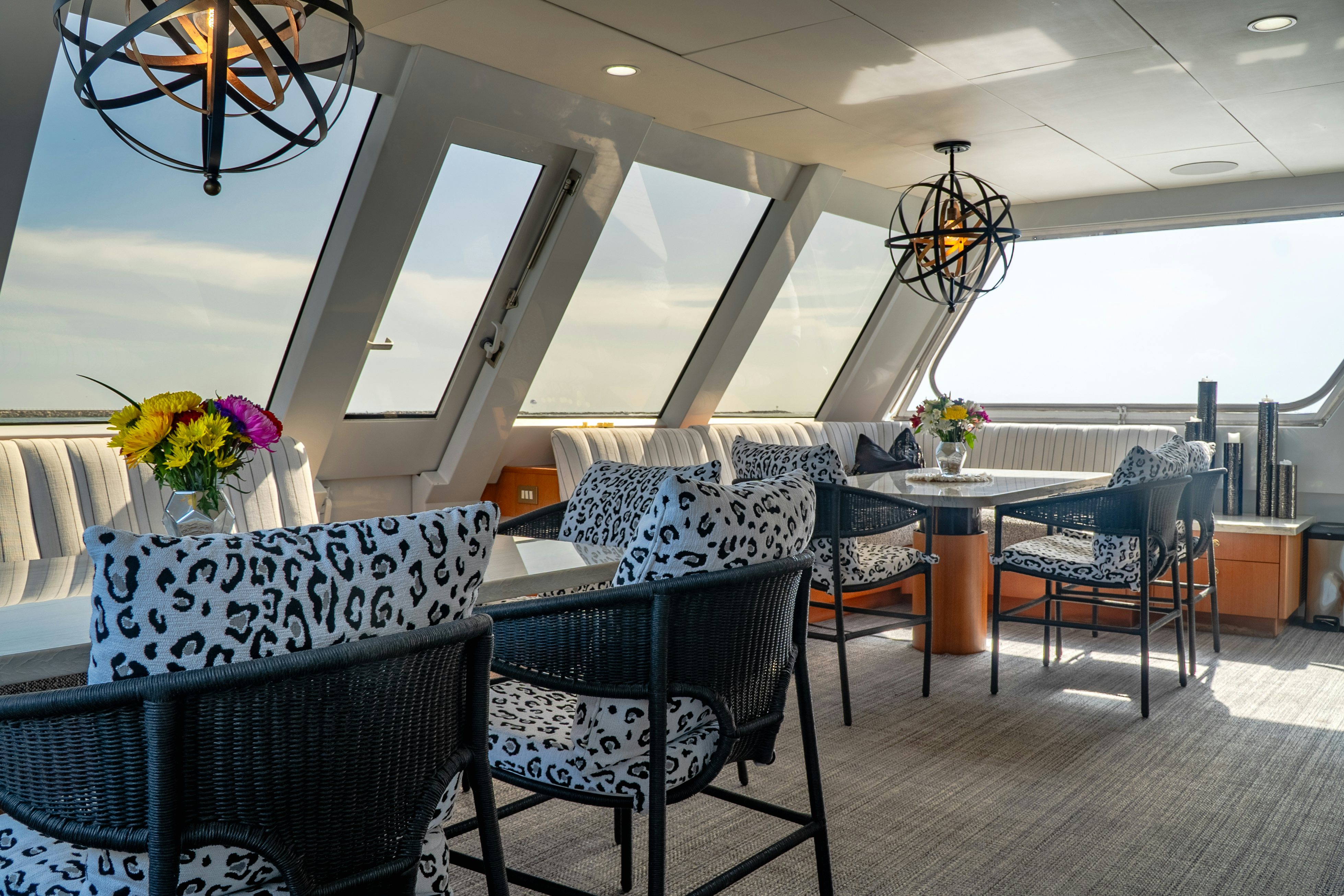 a room with chairs and tables aboard GALE WINDS Yacht for Sale