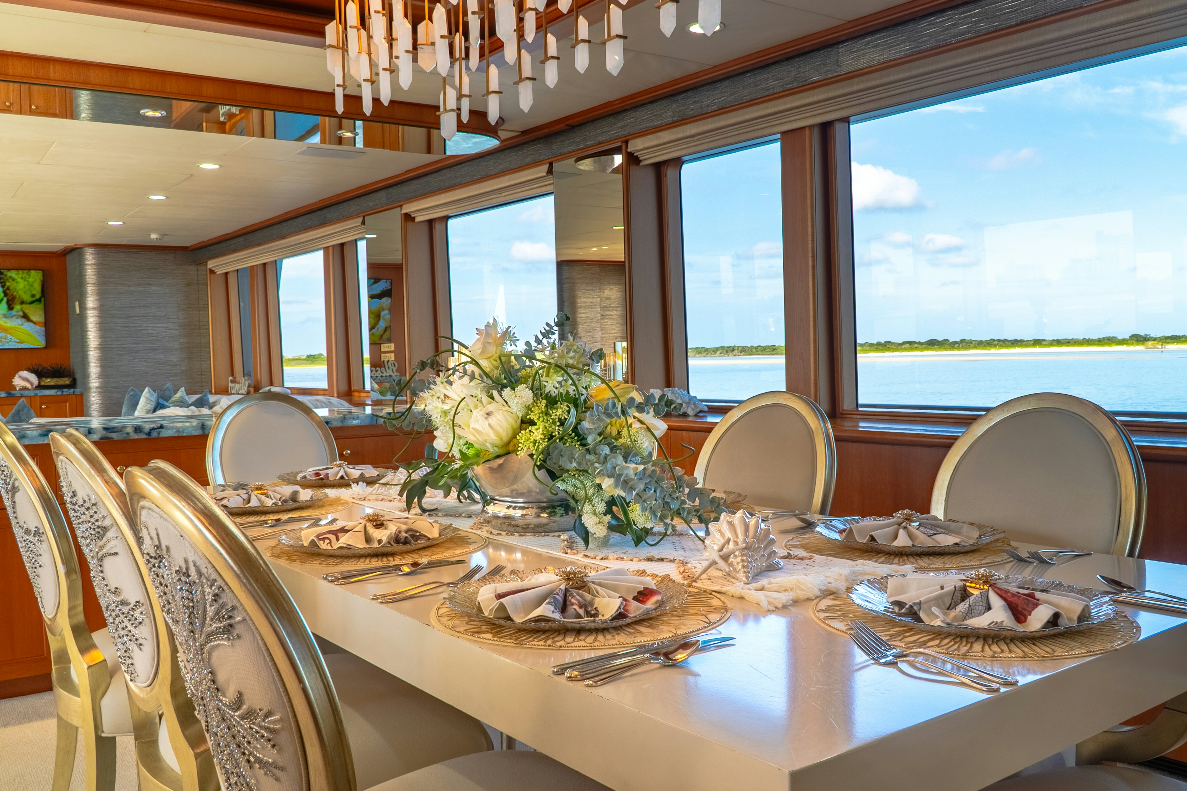 a table set for a dinner aboard GALE WINDS Yacht for Sale