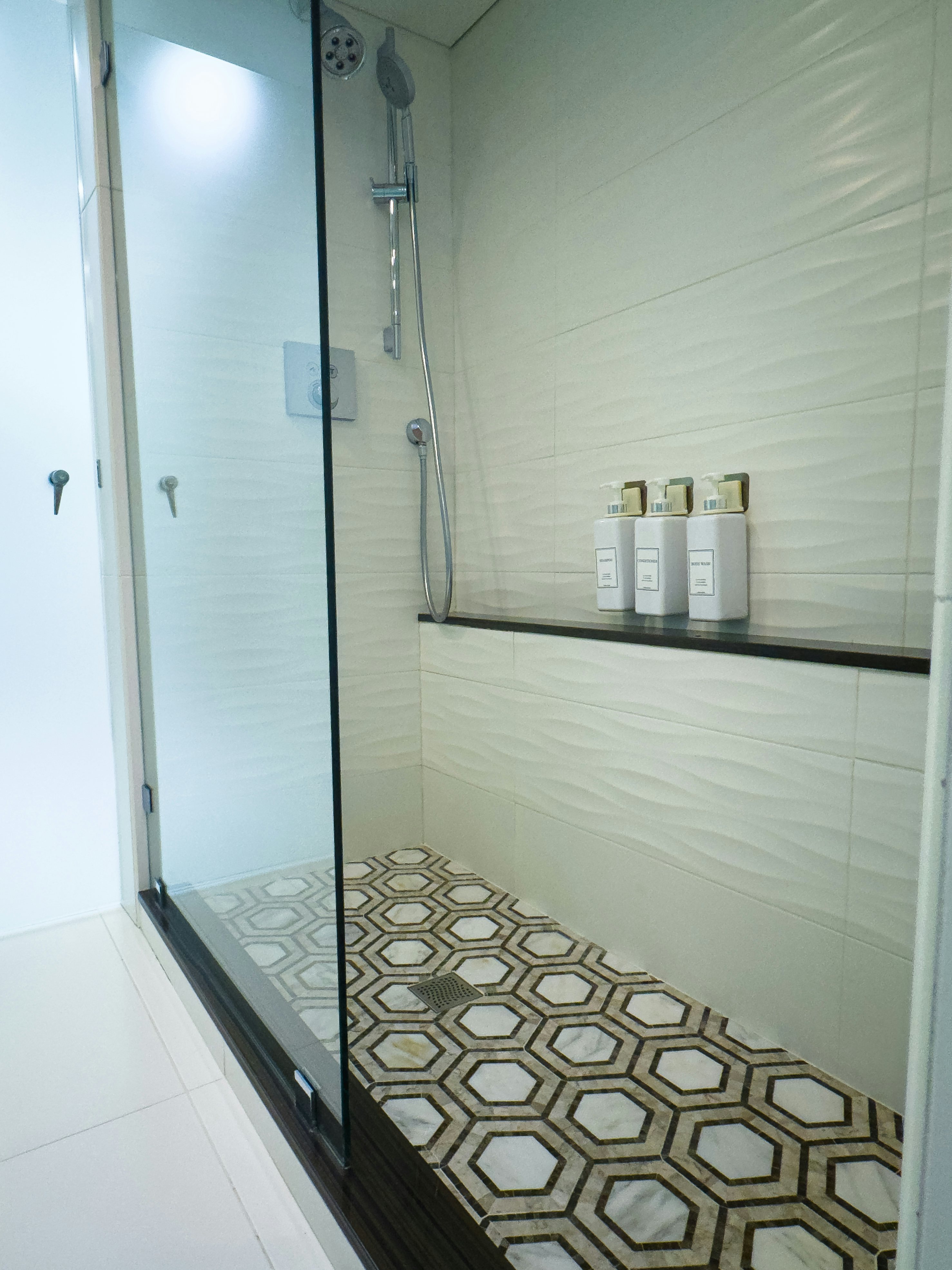 a bathroom with a shower unit aboard GALE WINDS Yacht for Sale