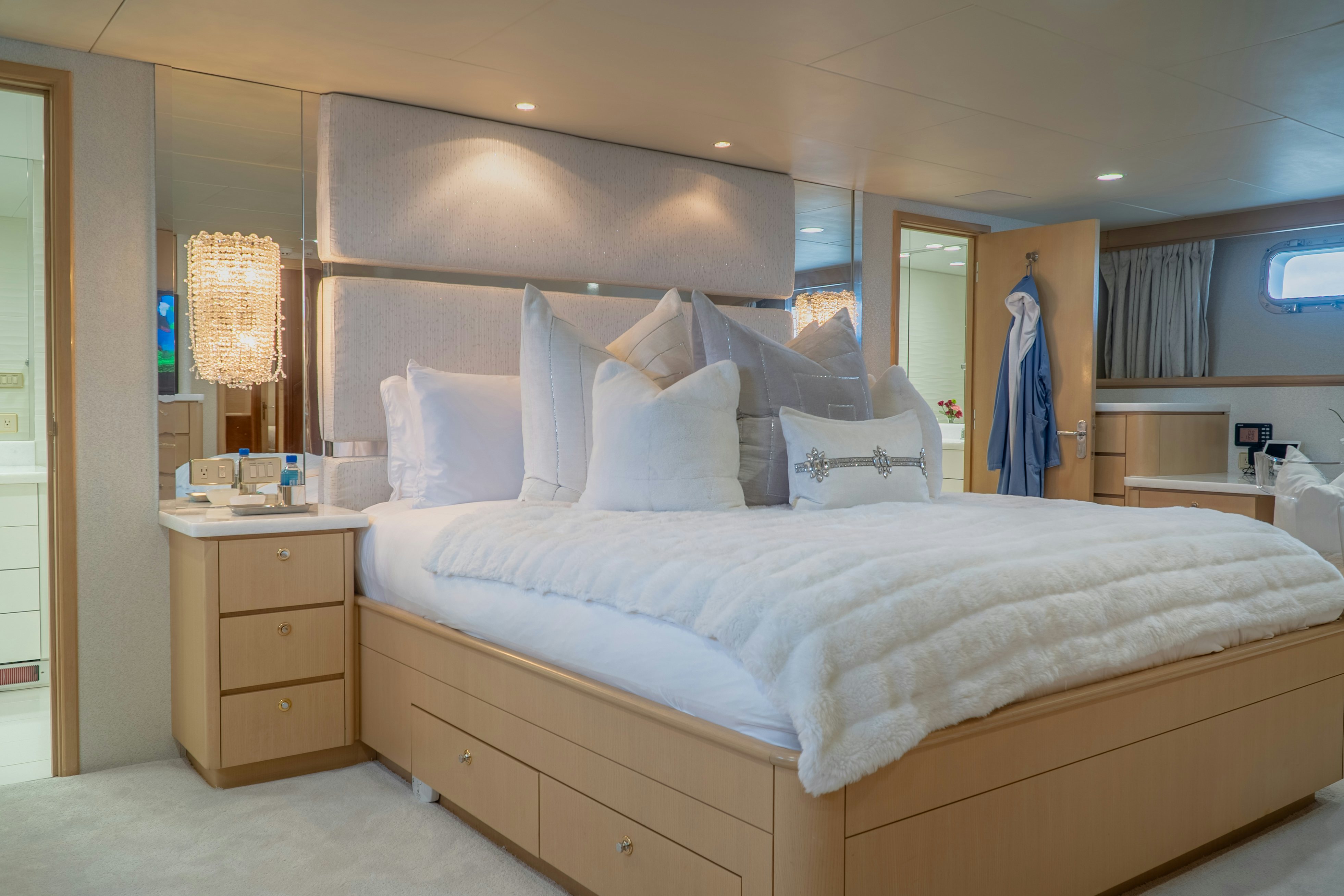 a bed with white sheets and pillows aboard GALE WINDS Yacht for Sale