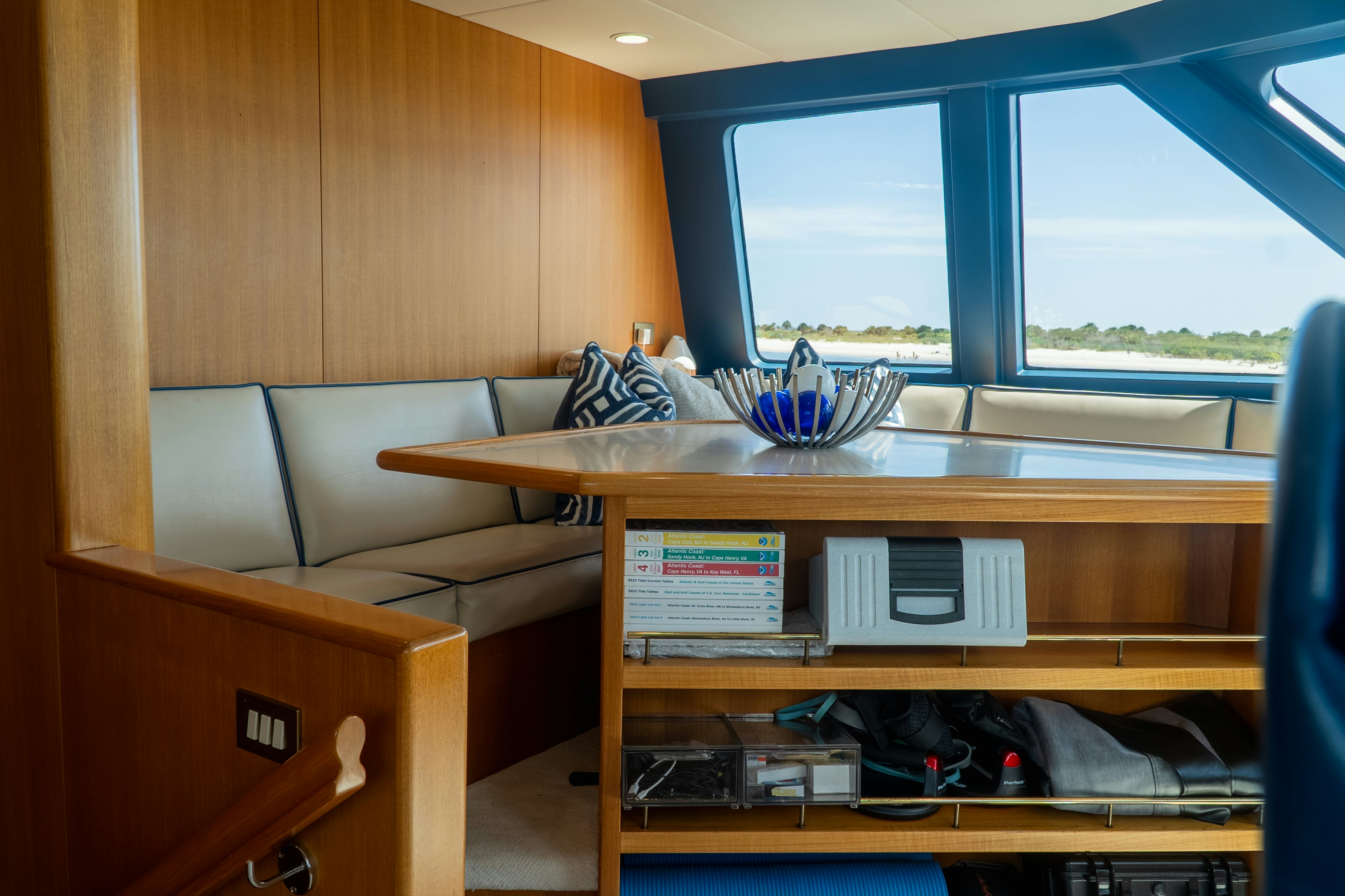 a desk with a computer and a chair aboard GALE WINDS Yacht for Sale