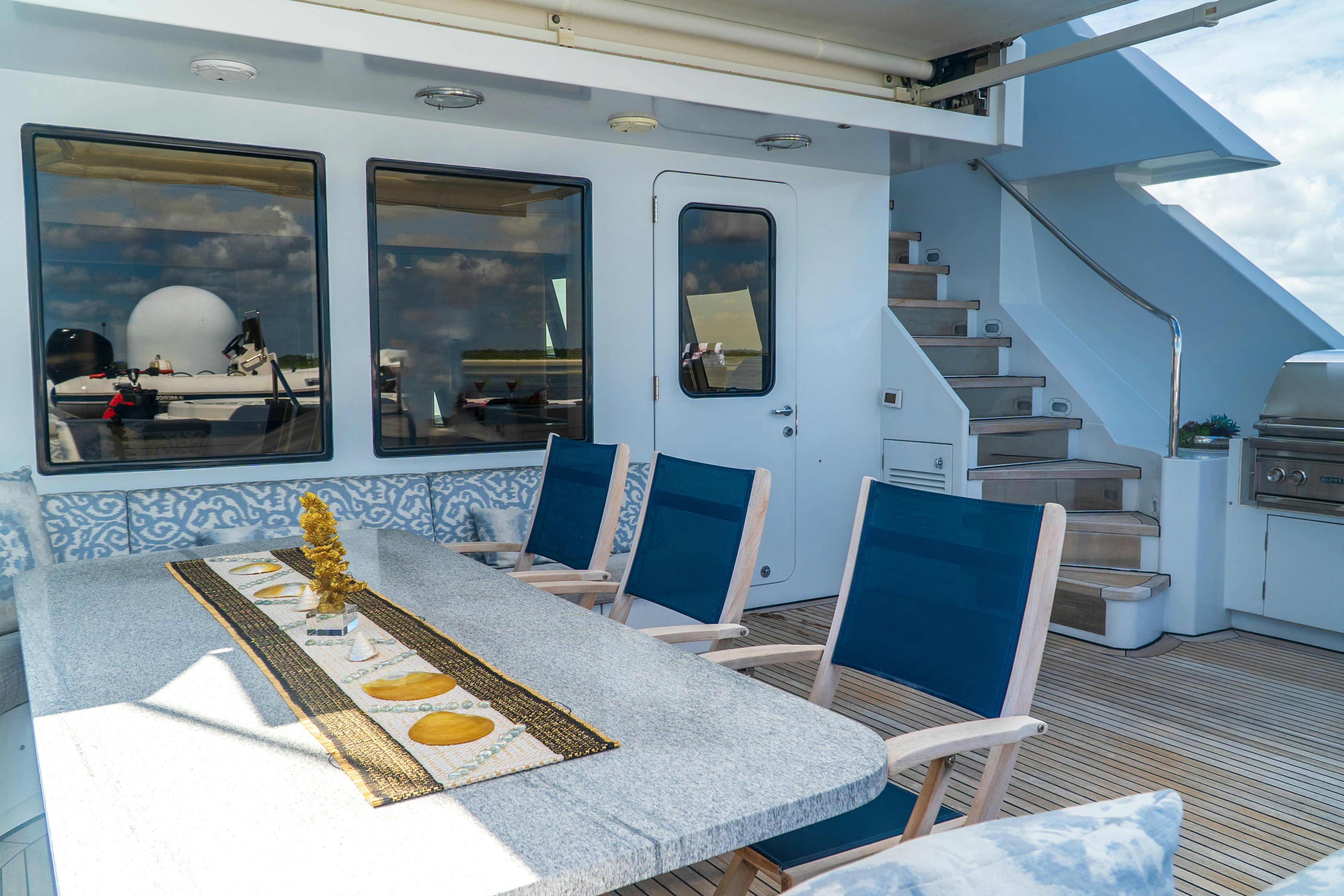 a room with a table and chairs aboard GALE WINDS Yacht for Sale