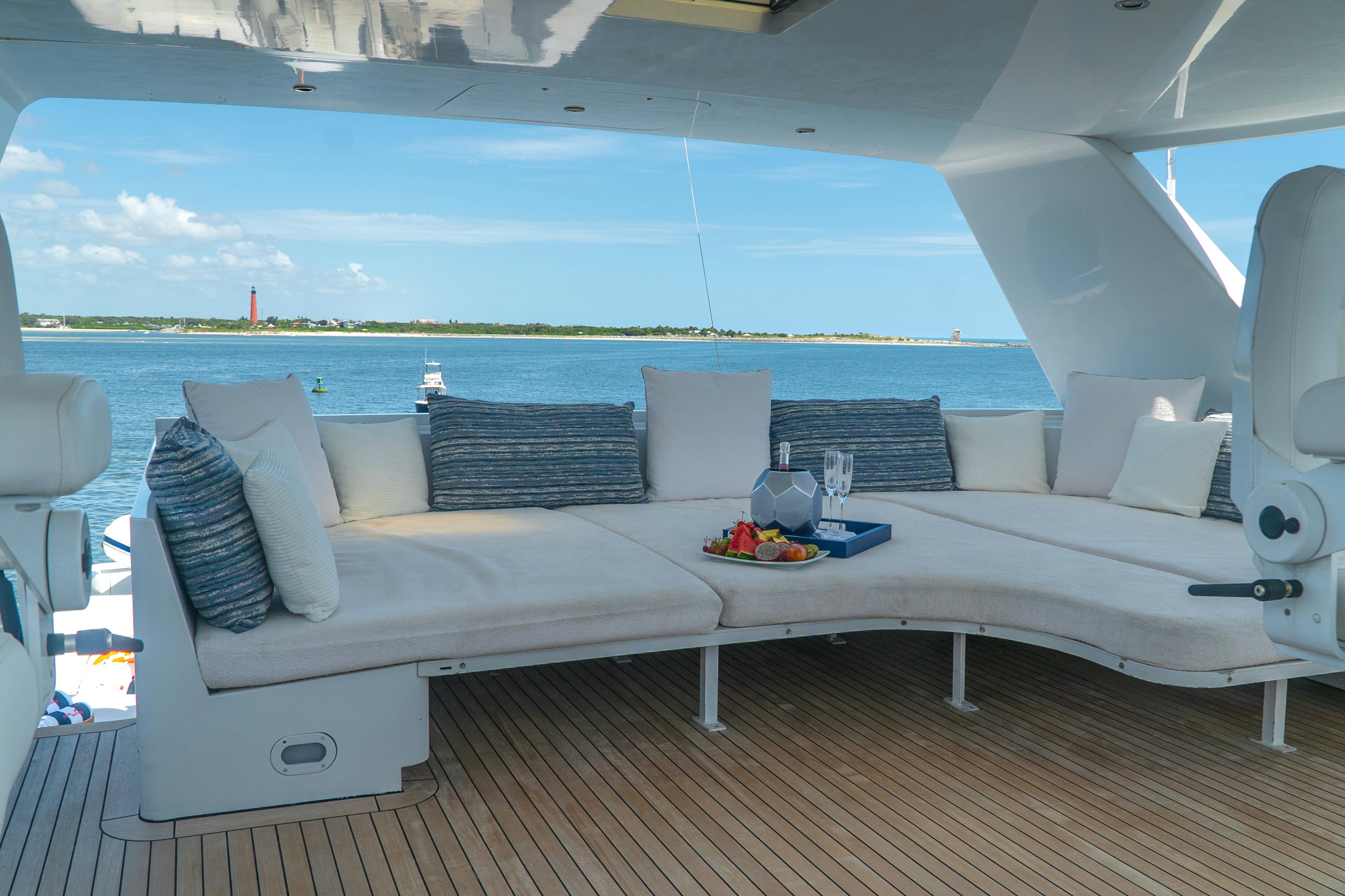 a white couch with pillows on it aboard GALE WINDS Yacht for Sale