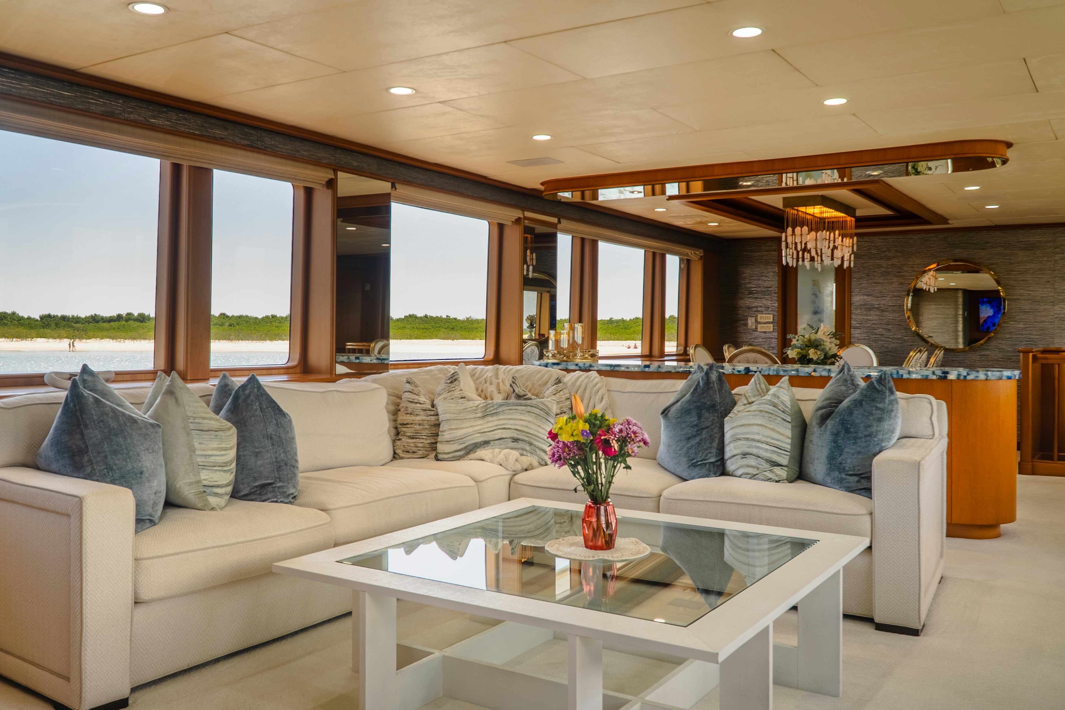 a living room with a large window aboard GALE WINDS Yacht for Sale