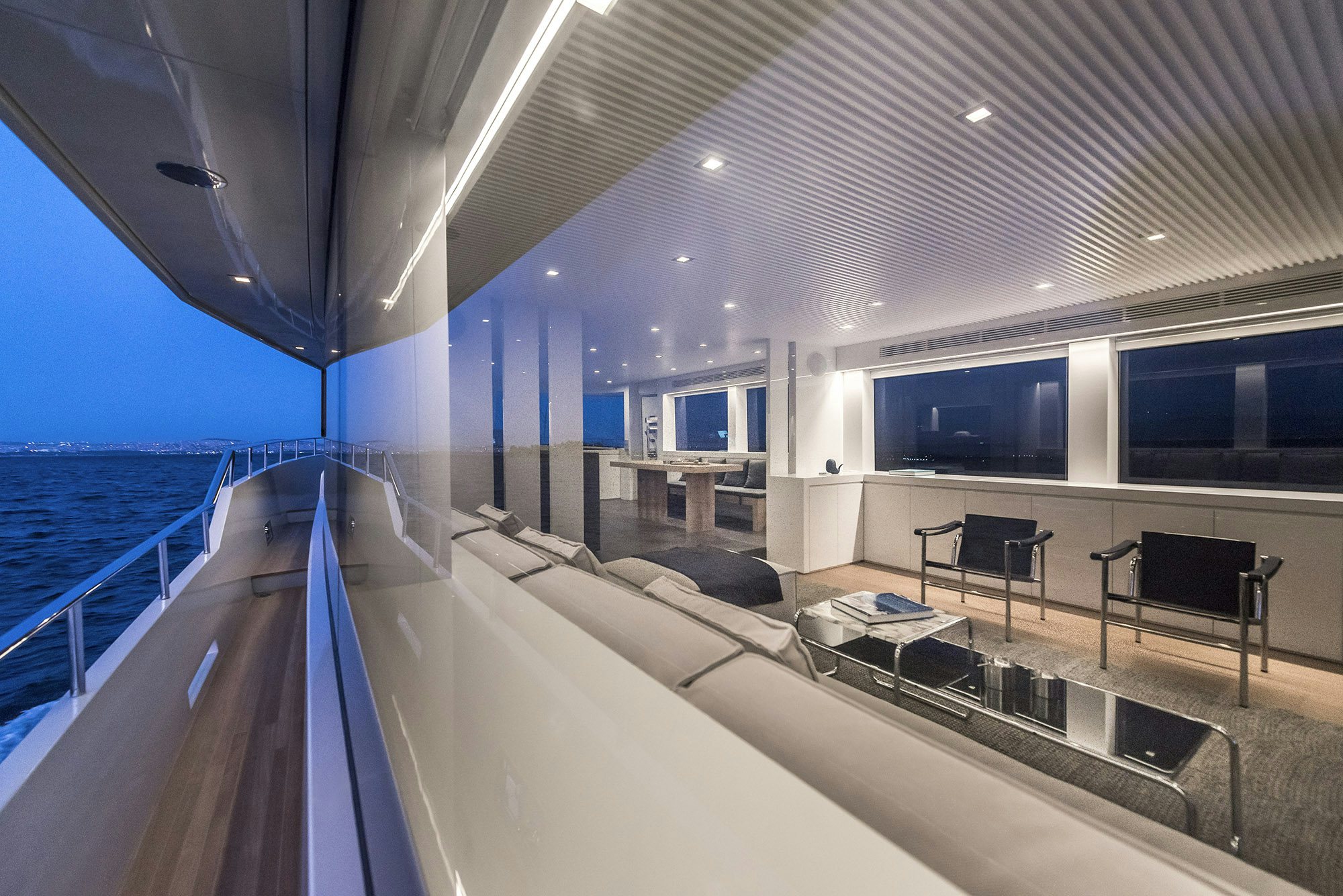 a large modern building with a pool aboard IGUAZU Yacht for Sale