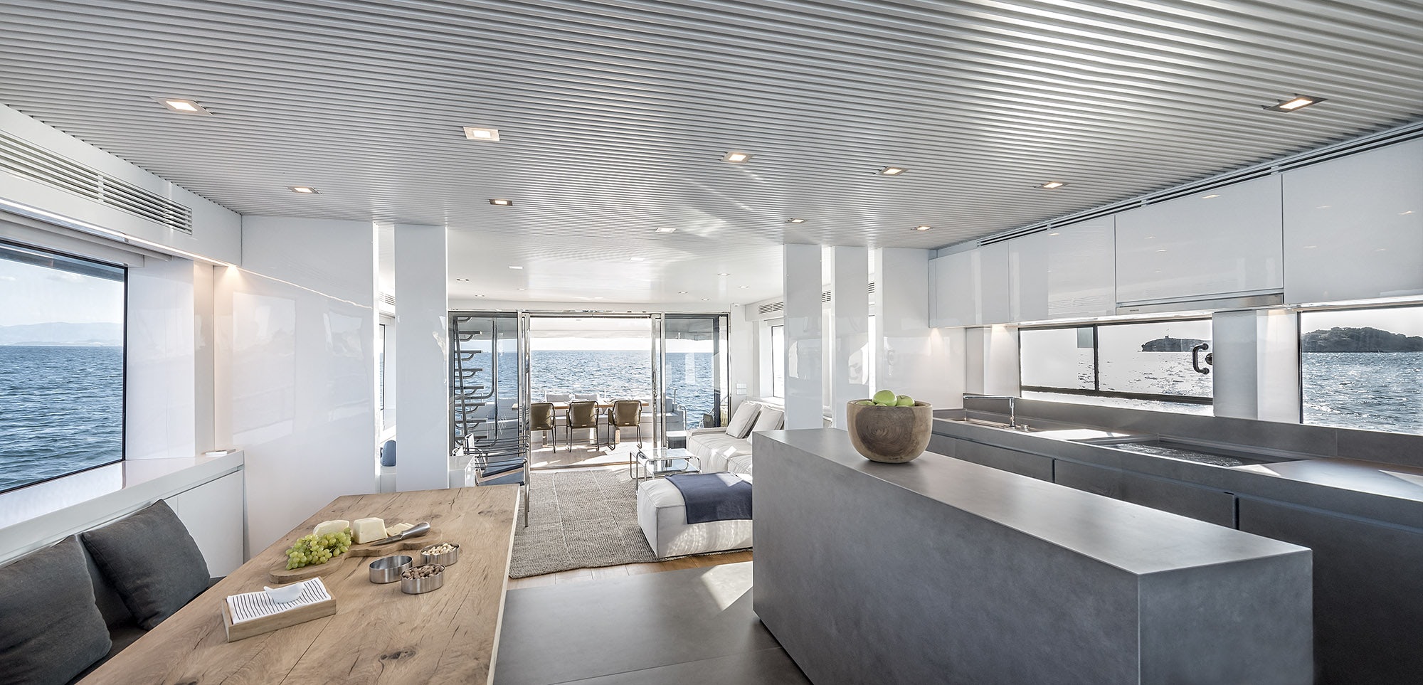 a large modern looking living room aboard IGUAZU Yacht for Sale