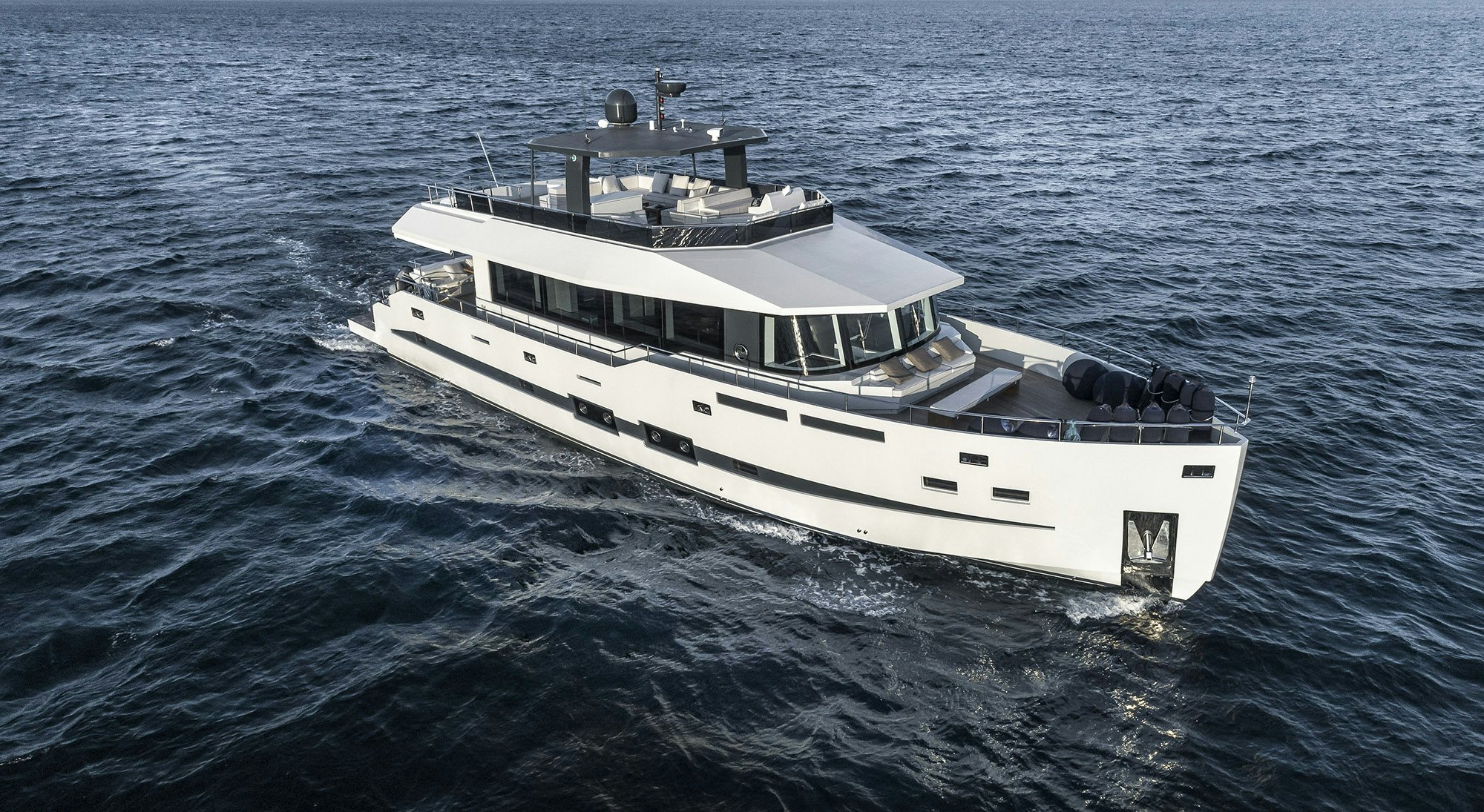 a large white boat in the water aboard IGUAZU Yacht for Sale