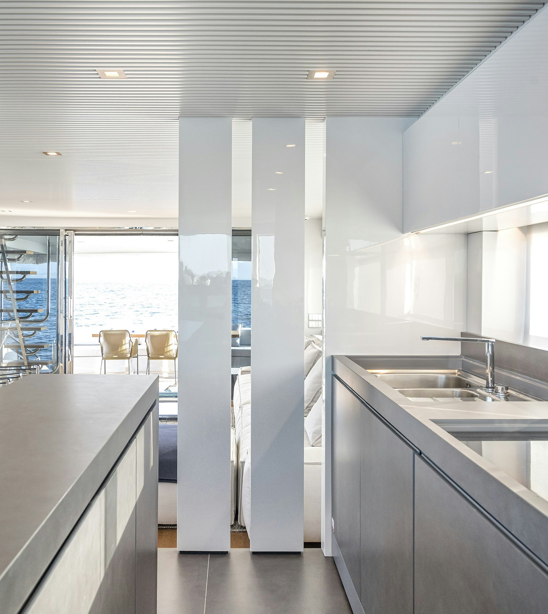 a kitchen with a large shower unit aboard IGUAZU Yacht for Sale
