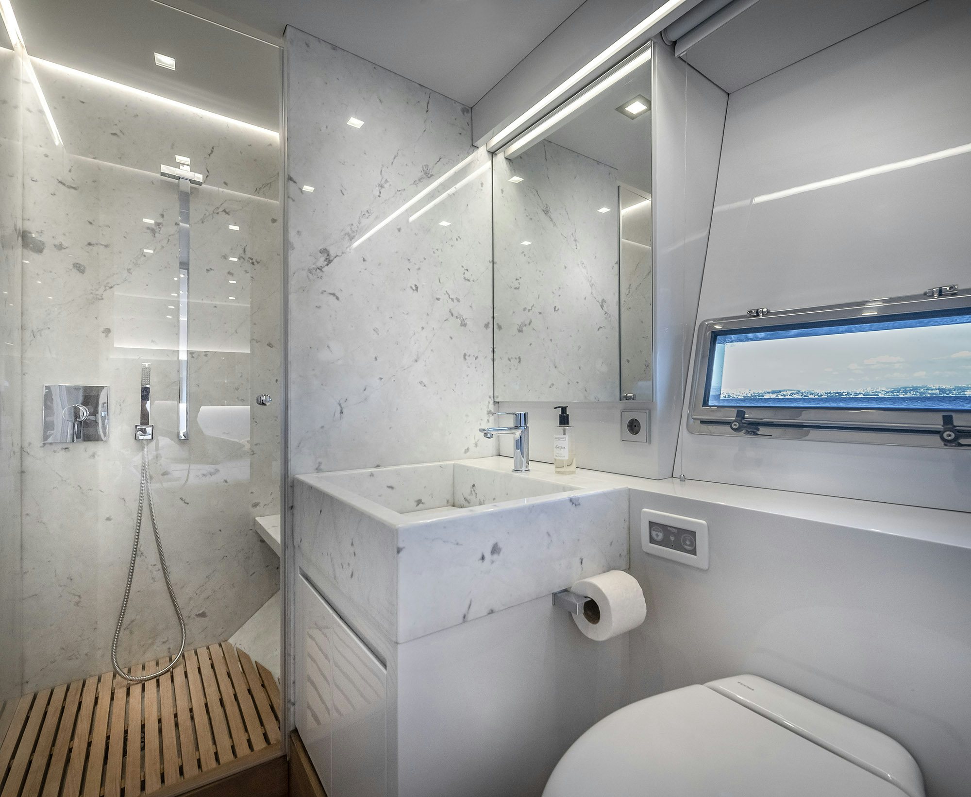 a bathroom with a sink and a toilet aboard IGUAZU Yacht for Sale