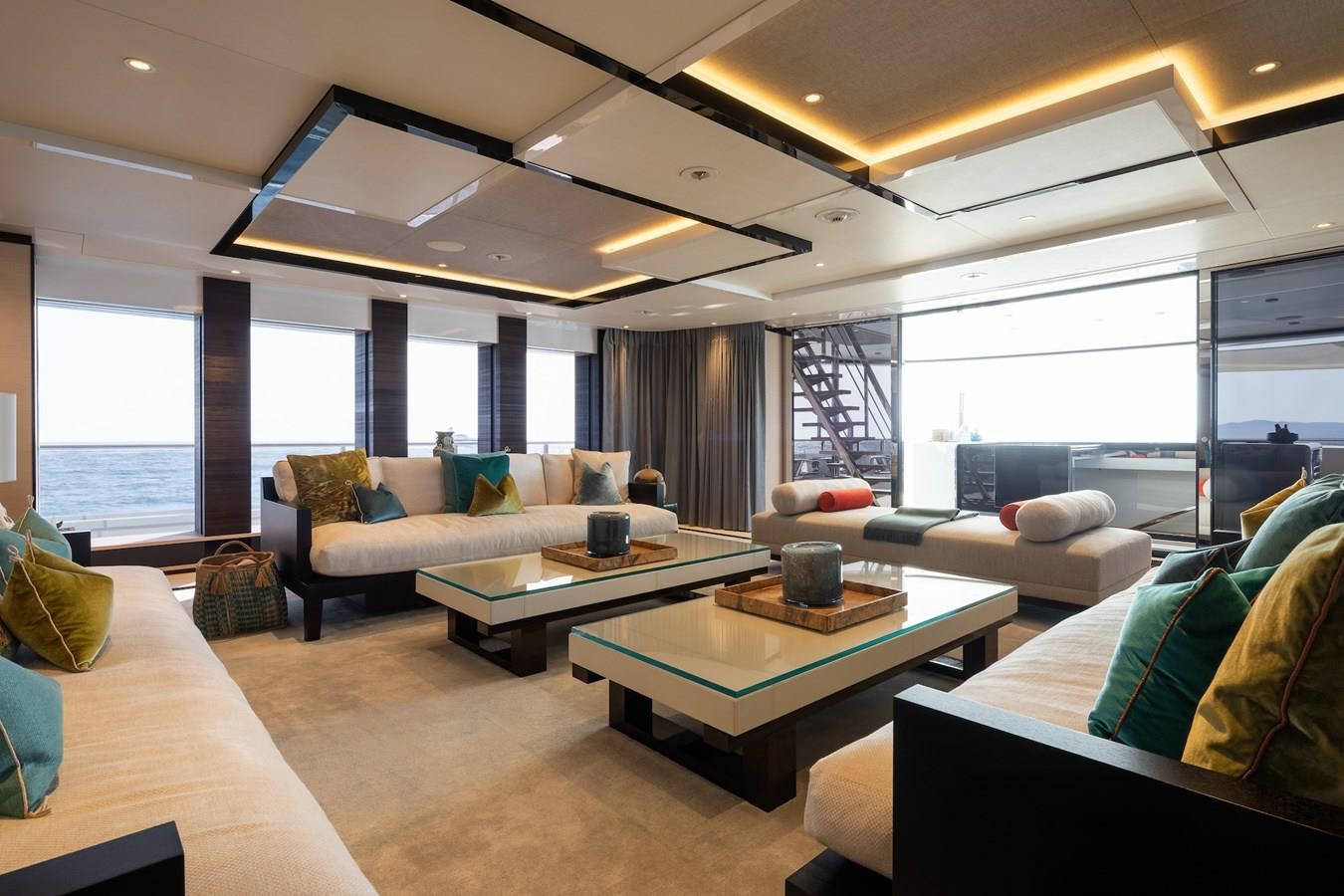 a living room with a large window aboard SAMURAI Yacht for Sale