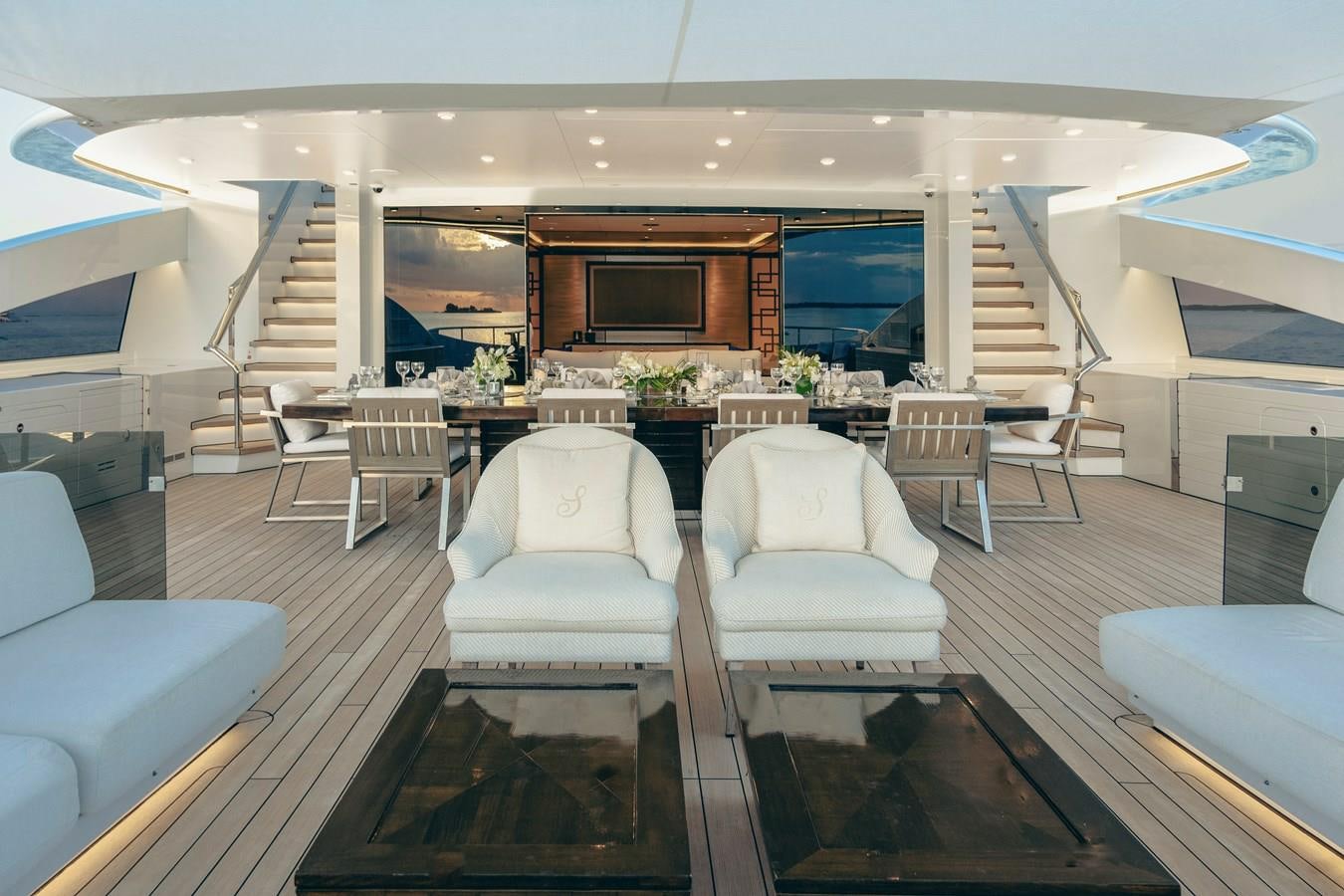 a large living room with a large glass window aboard SAMURAI Yacht for Sale