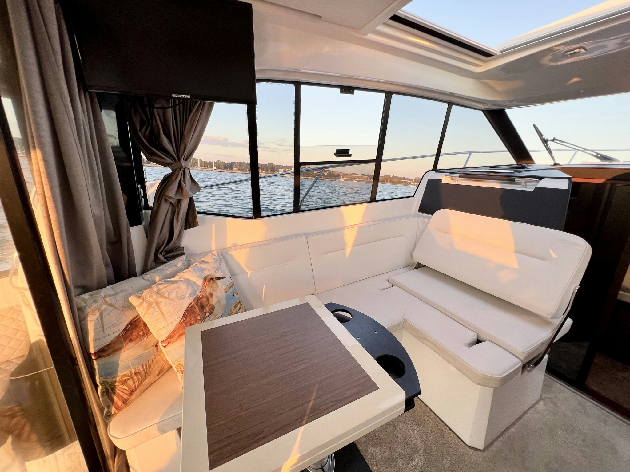 a room with a table and chairs aboard SUMMER HOME Yacht for Sale