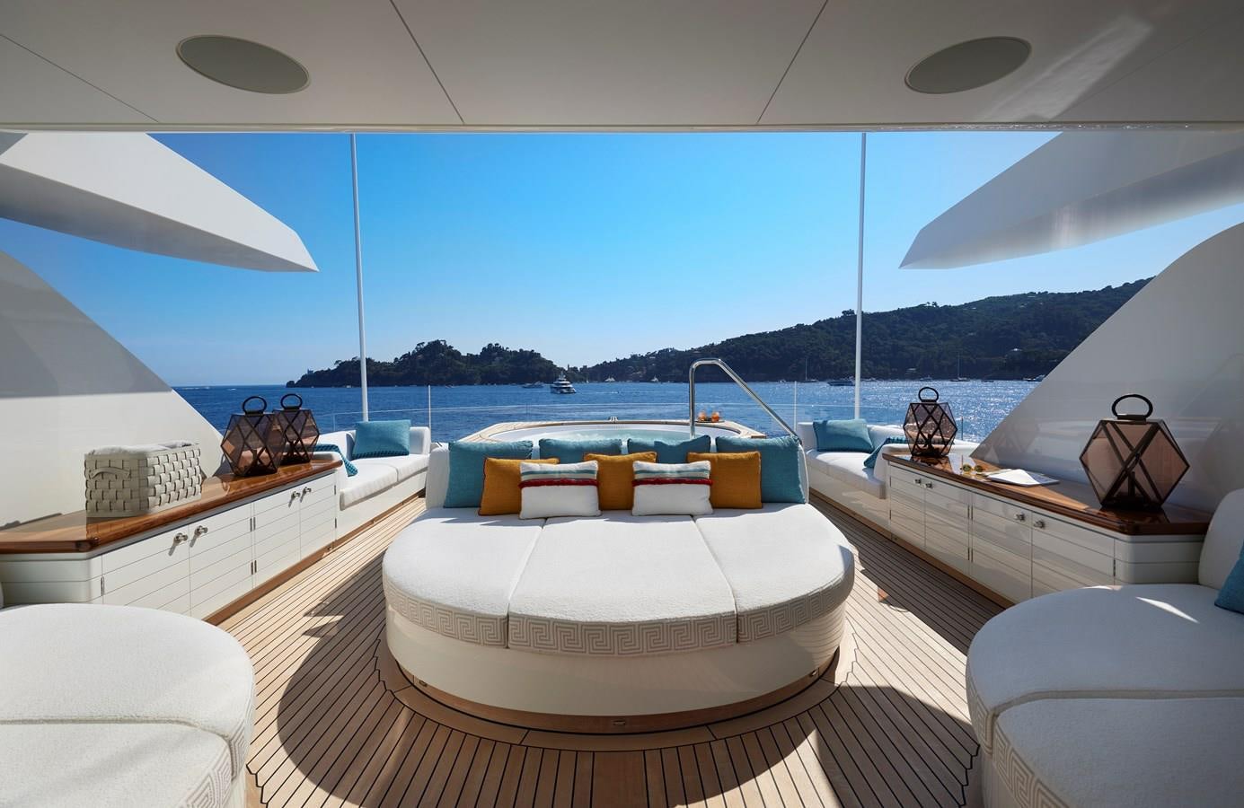 a room with a bed and a large body of water aboard SOMNIUM Yacht for Sale
