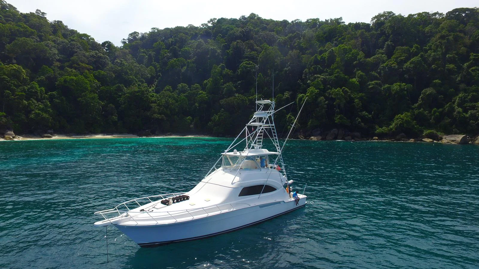 a boat on the water aboard ISAKINDOFMAGIC Yacht for Sale