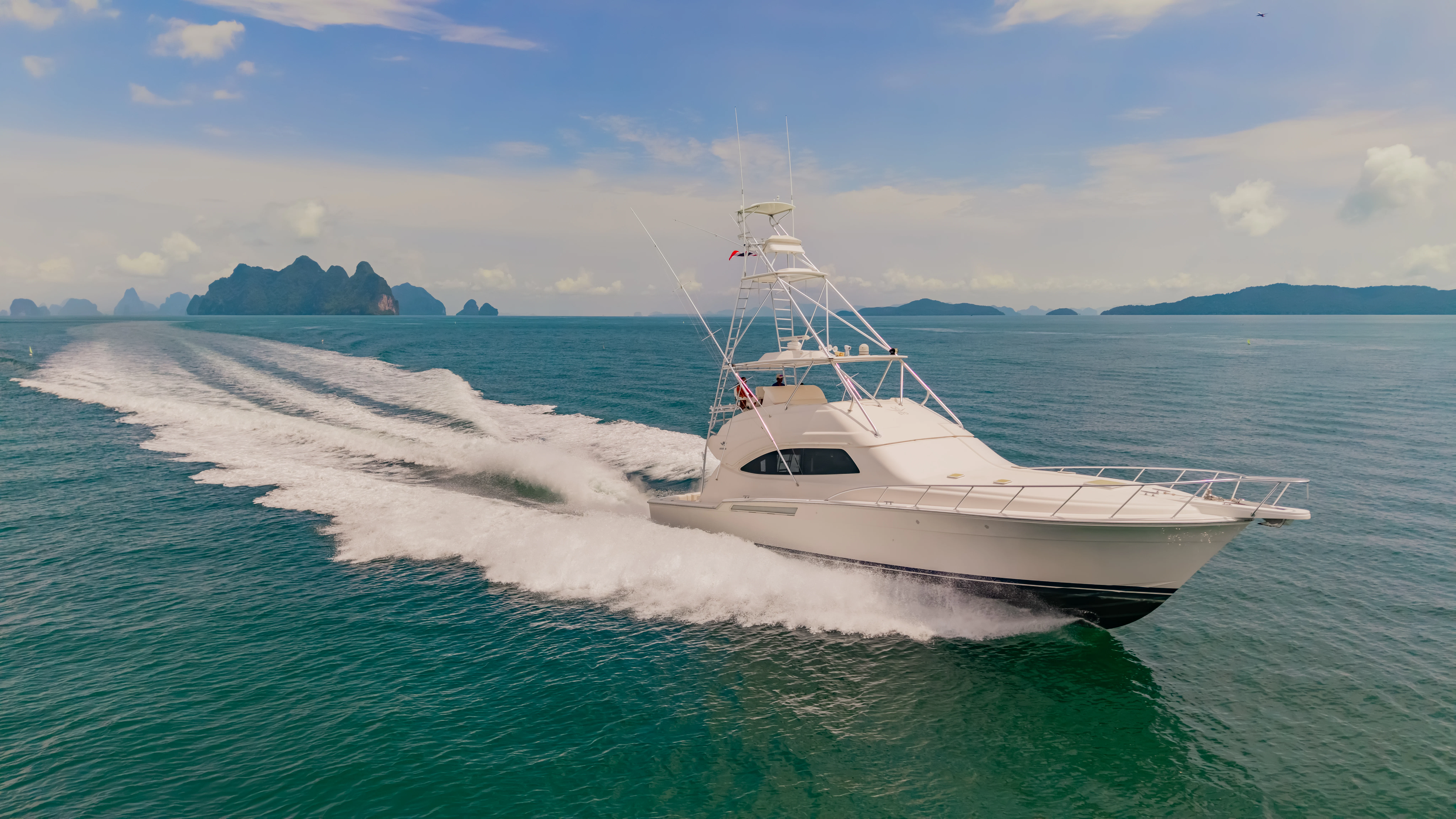 a boat on the water aboard ISAKINDOFMAGIC Yacht for Sale
