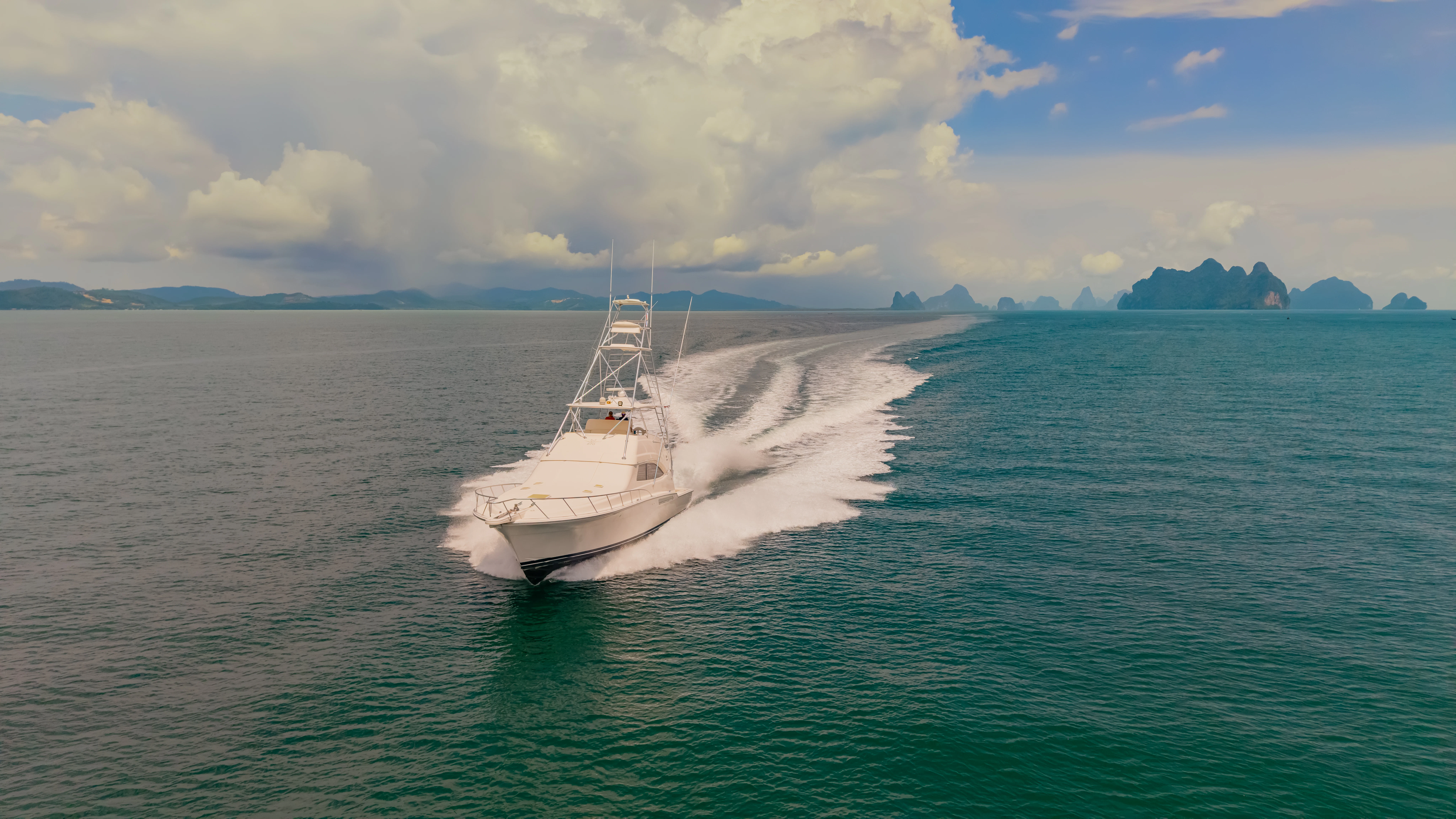 a boat on the water aboard ISAKINDOFMAGIC Yacht for Sale