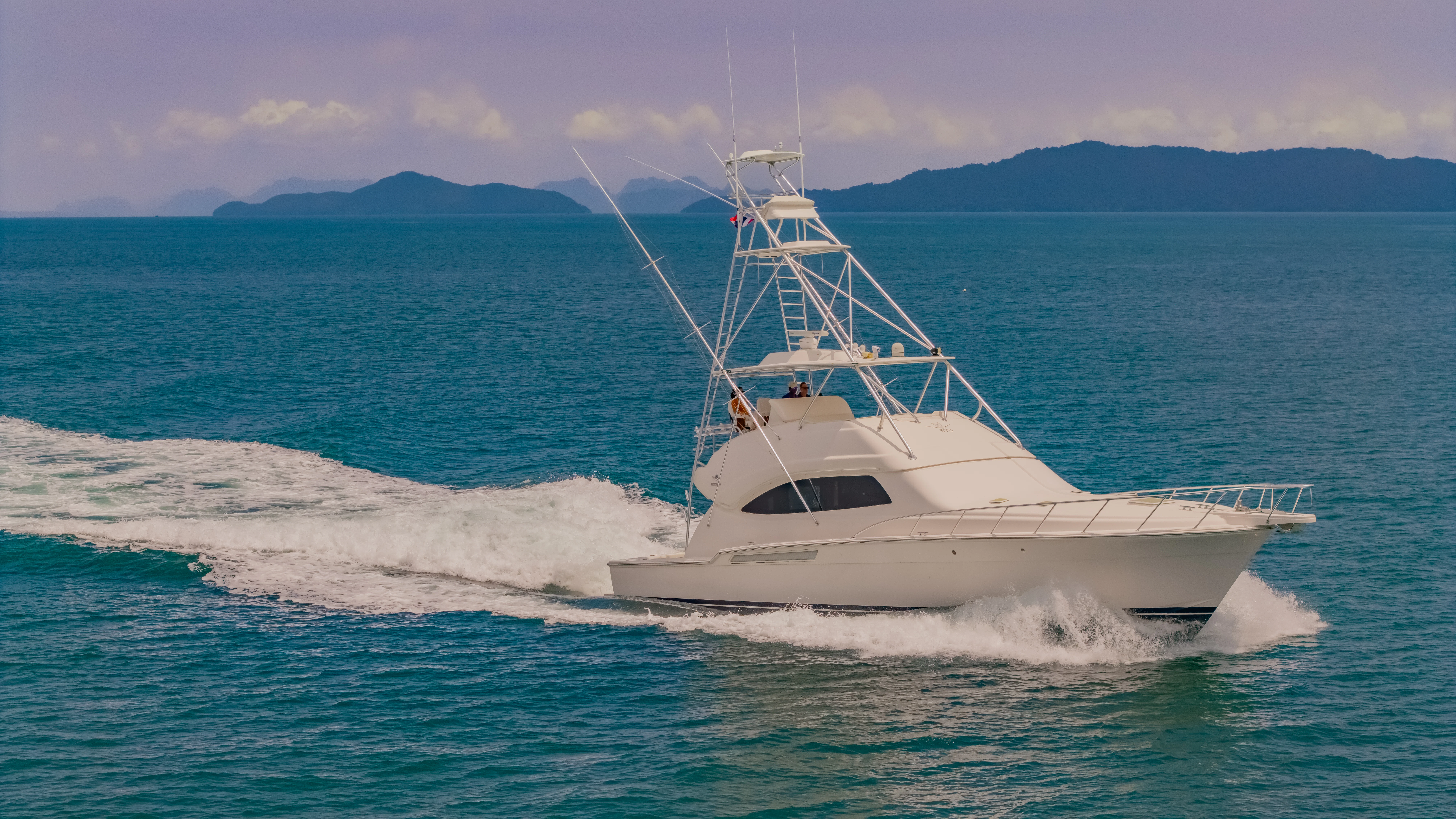 a boat on the water aboard ISAKINDOFMAGIC Yacht for Sale