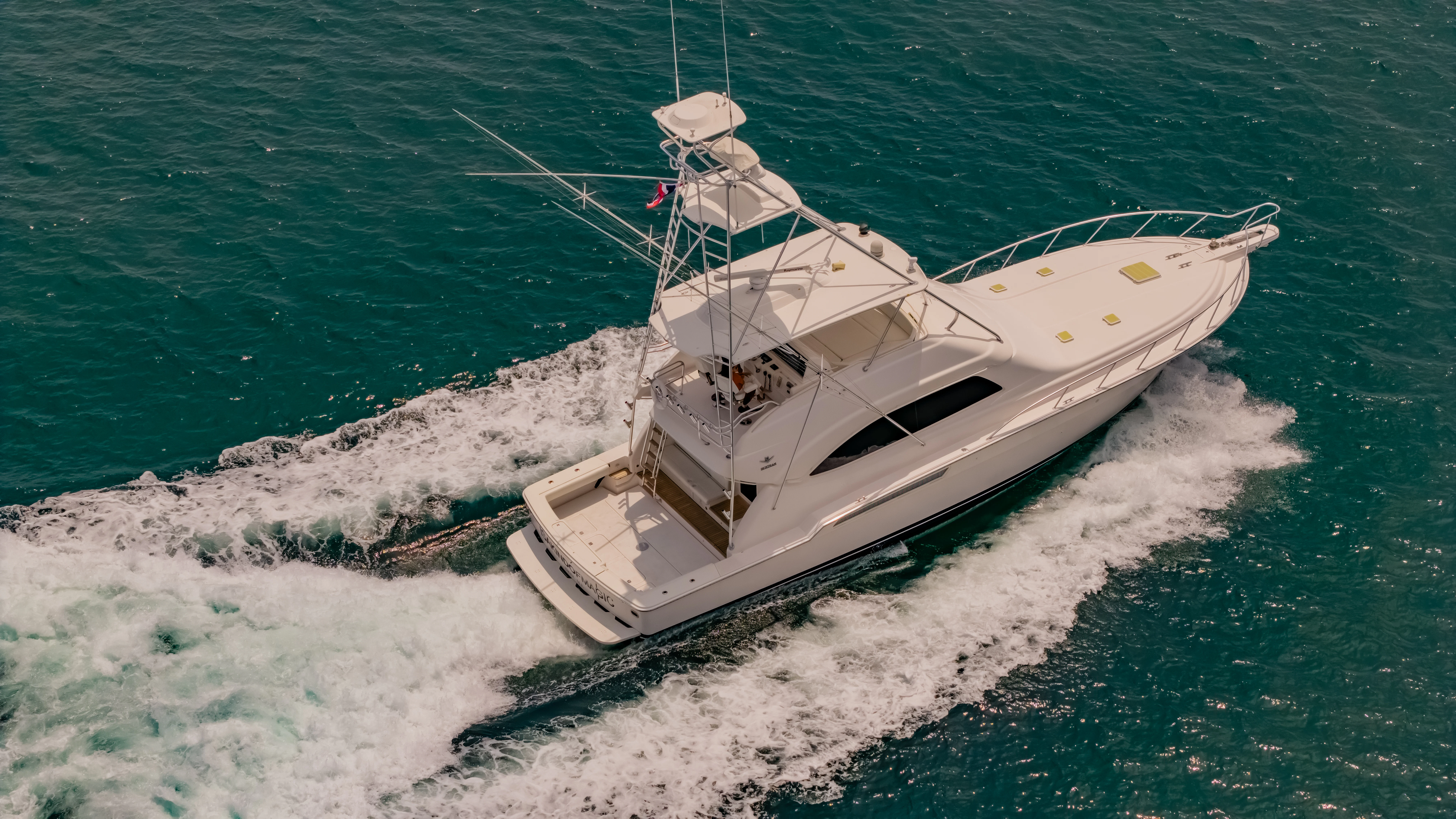a boat on the water aboard ISAKINDOFMAGIC Yacht for Sale