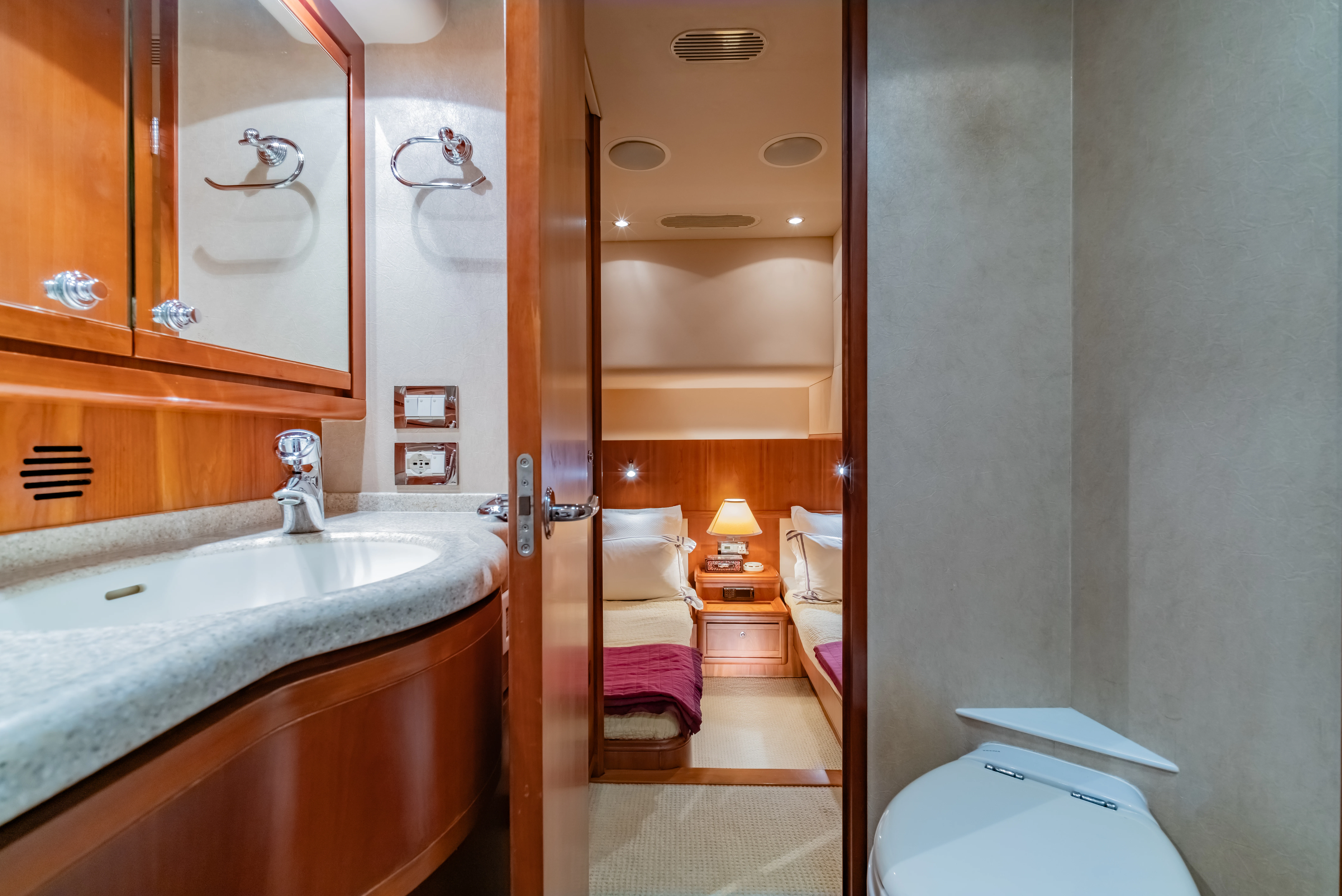 a bathroom with a sink and a mirror aboard ISAKINDOFMAGIC Yacht for Sale