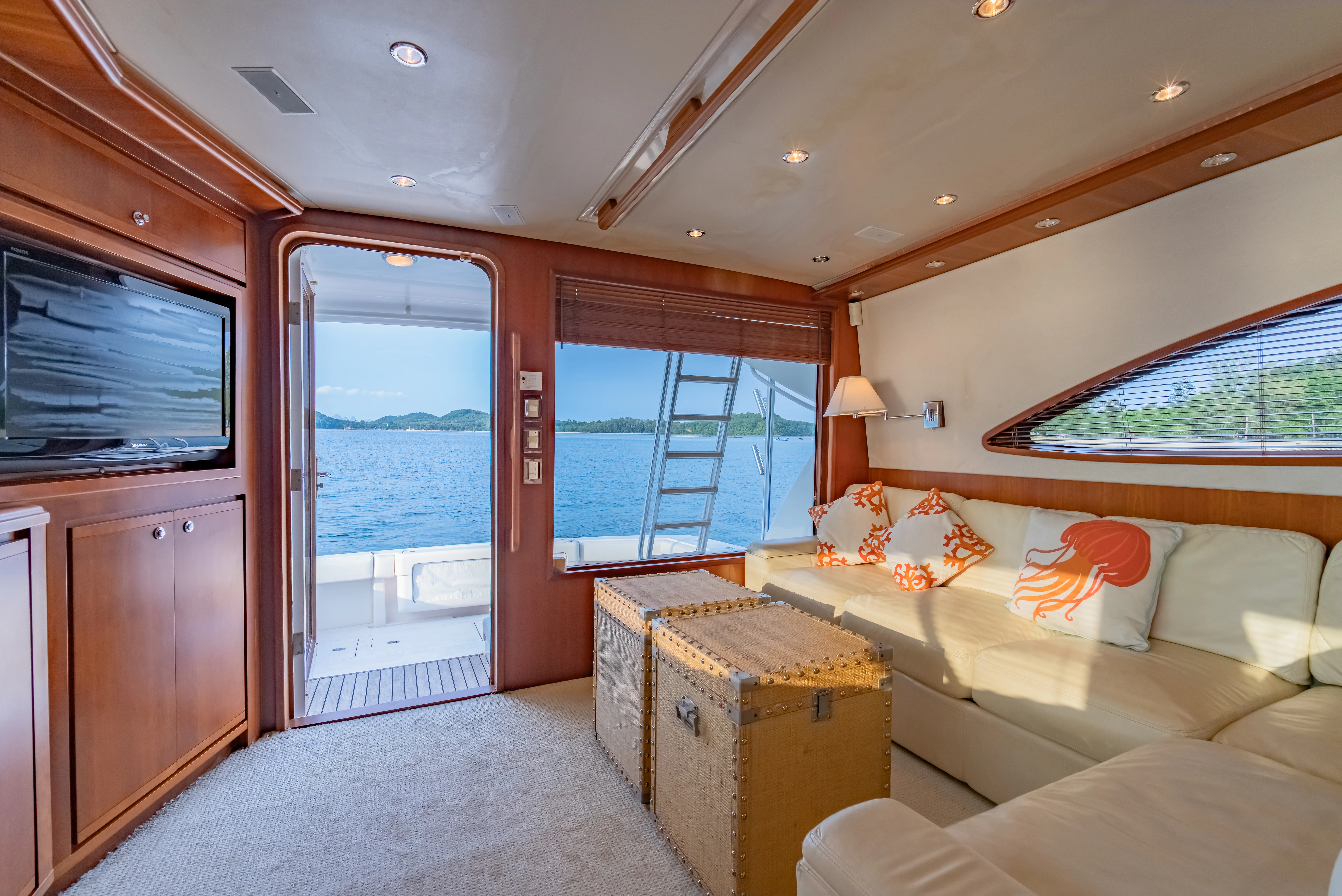 a bedroom with a bed and a tv aboard ISAKINDOFMAGIC Yacht for Sale
