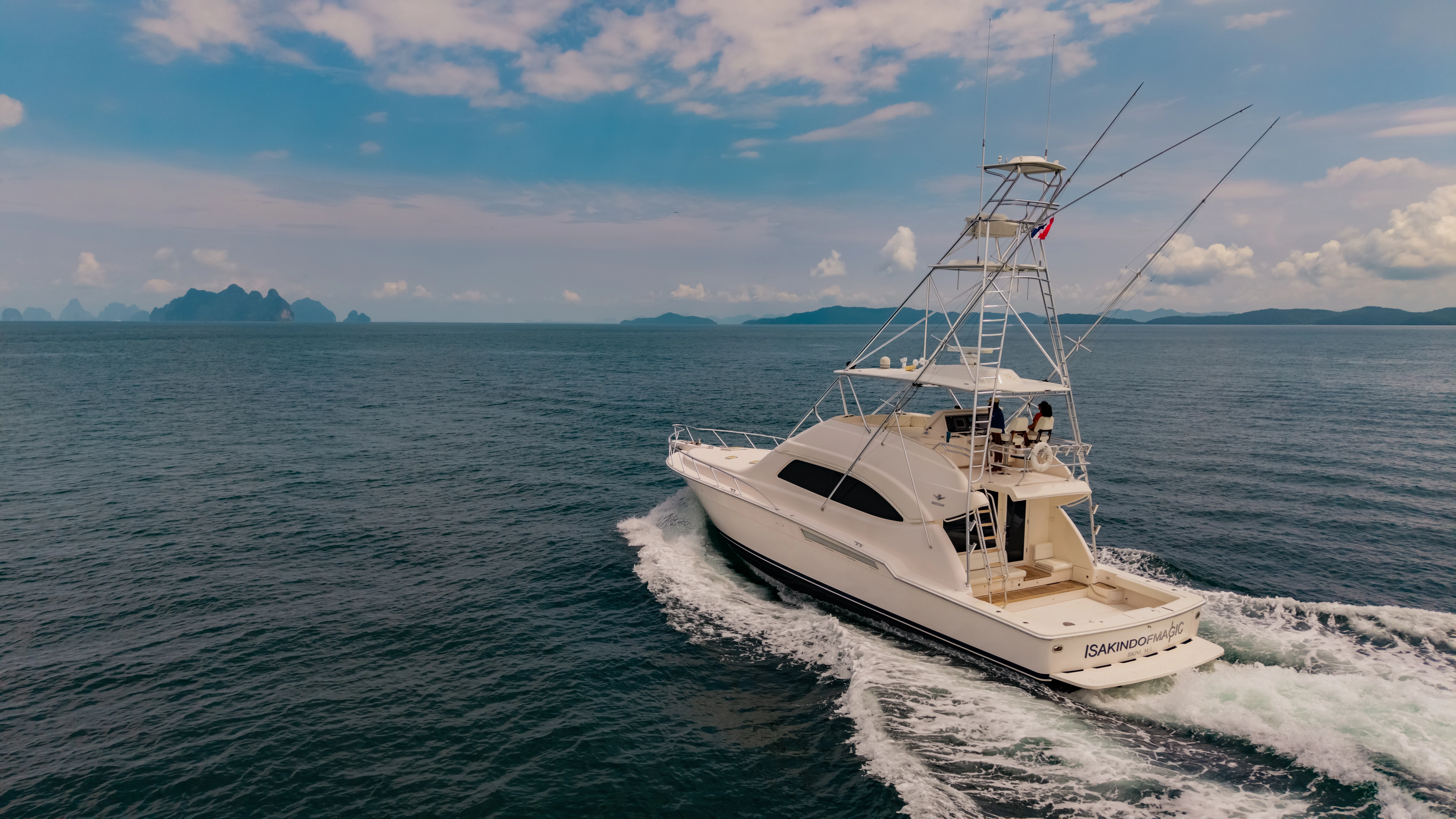 a boat on the water aboard ISAKINDOFMAGIC Yacht for Sale