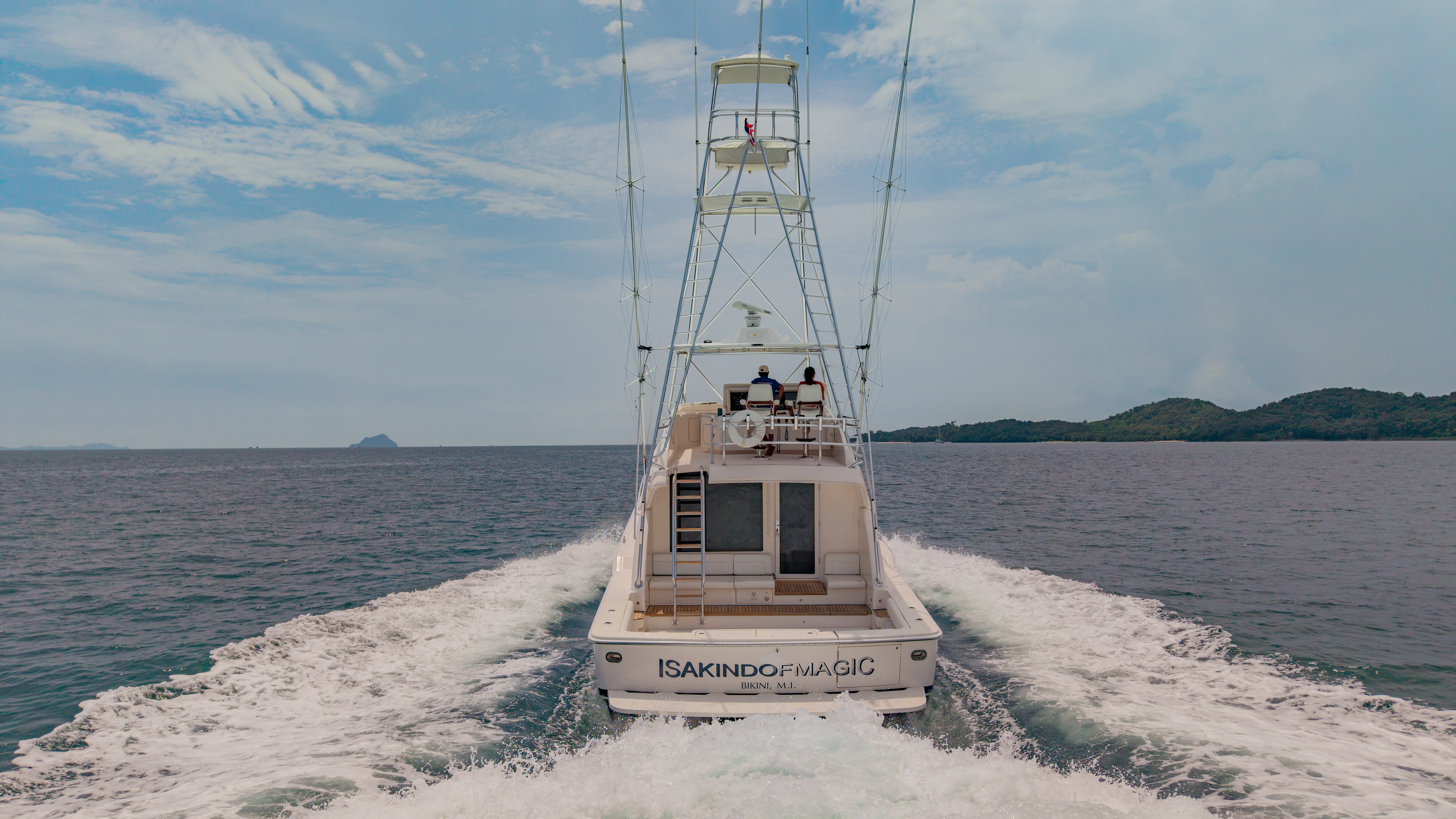a boat on the water aboard ISAKINDOFMAGIC Yacht for Sale