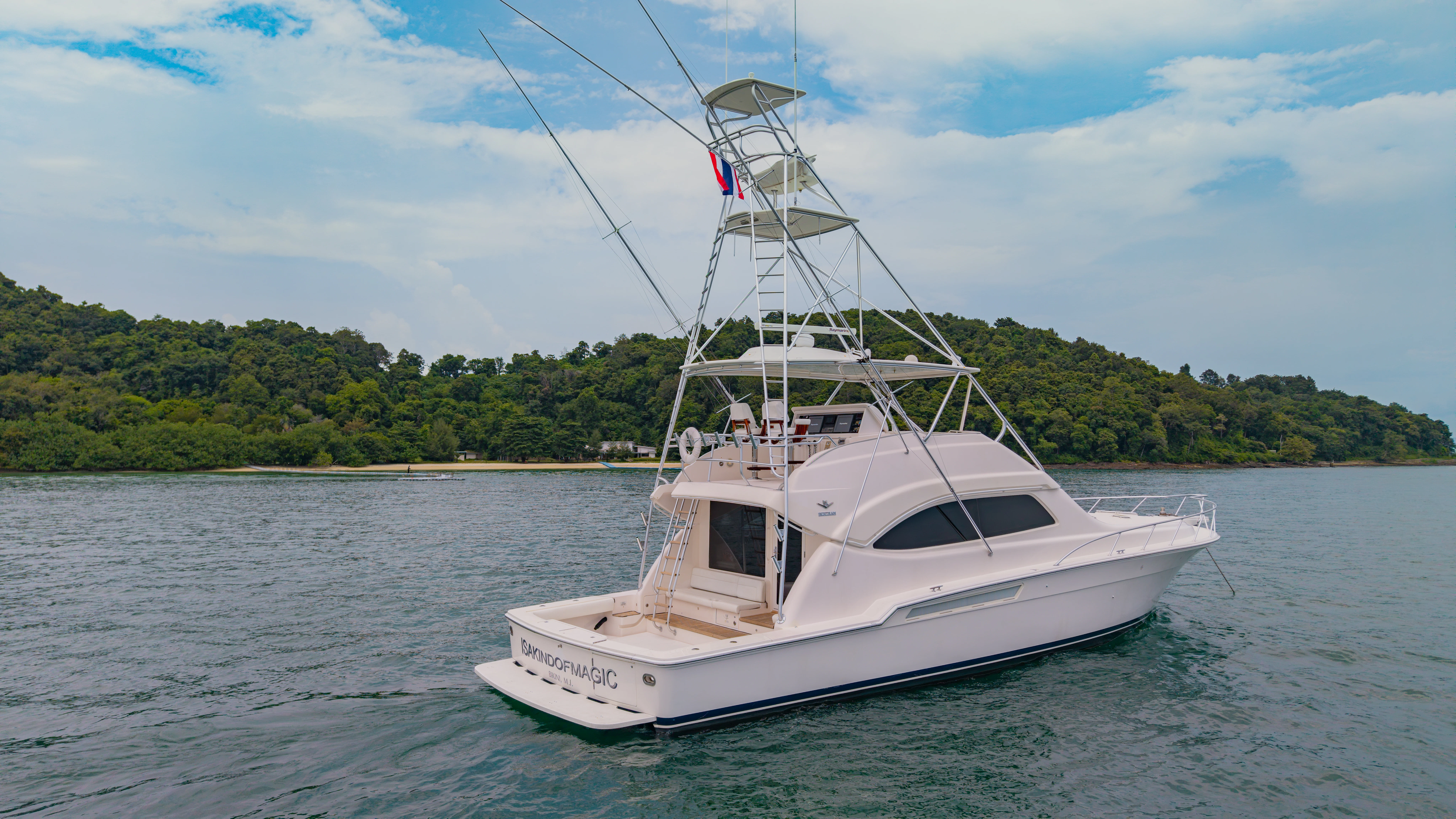 a boat on the water aboard ISAKINDOFMAGIC Yacht for Sale