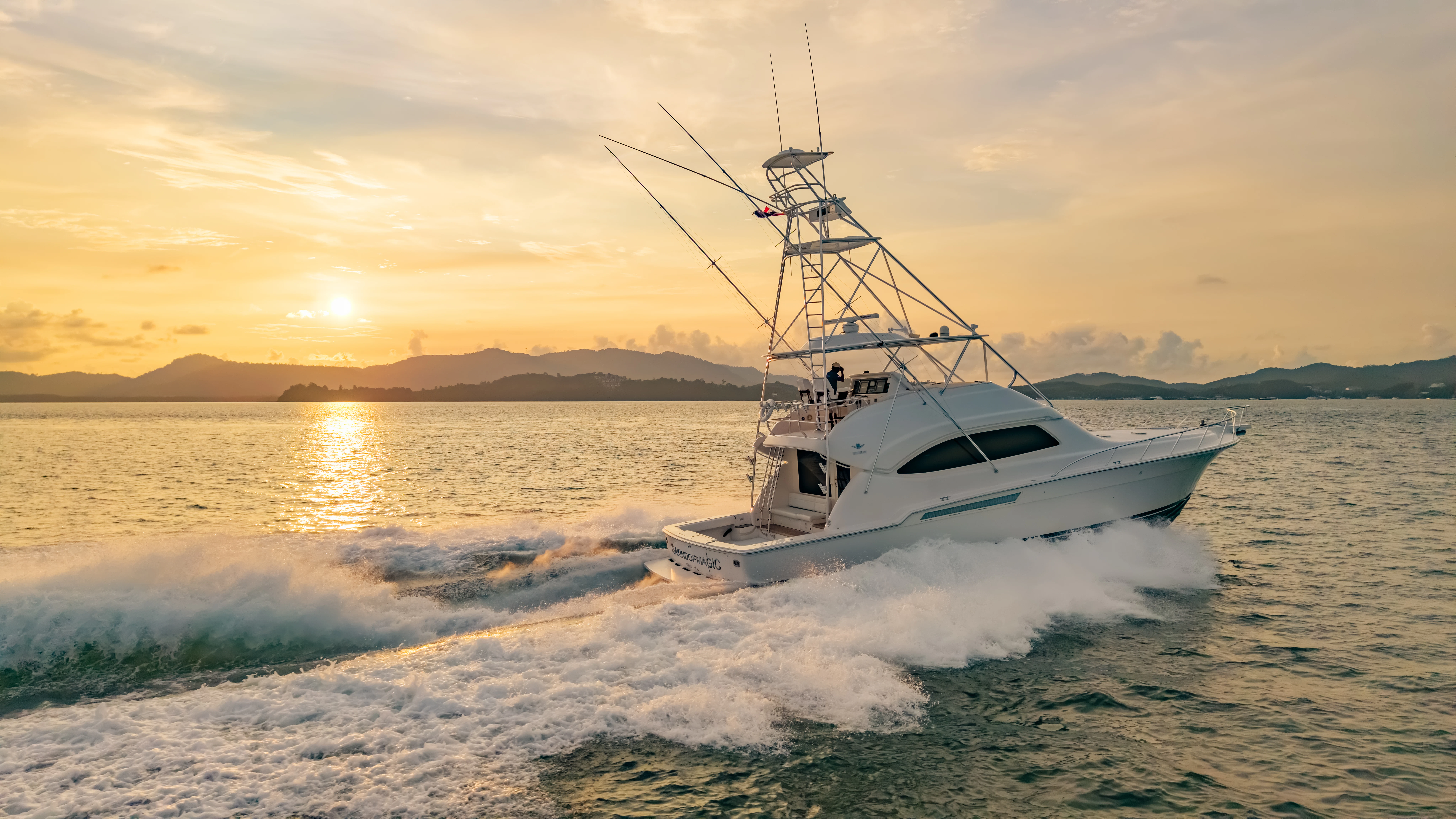 a boat on the water aboard ISAKINDOFMAGIC Yacht for Sale