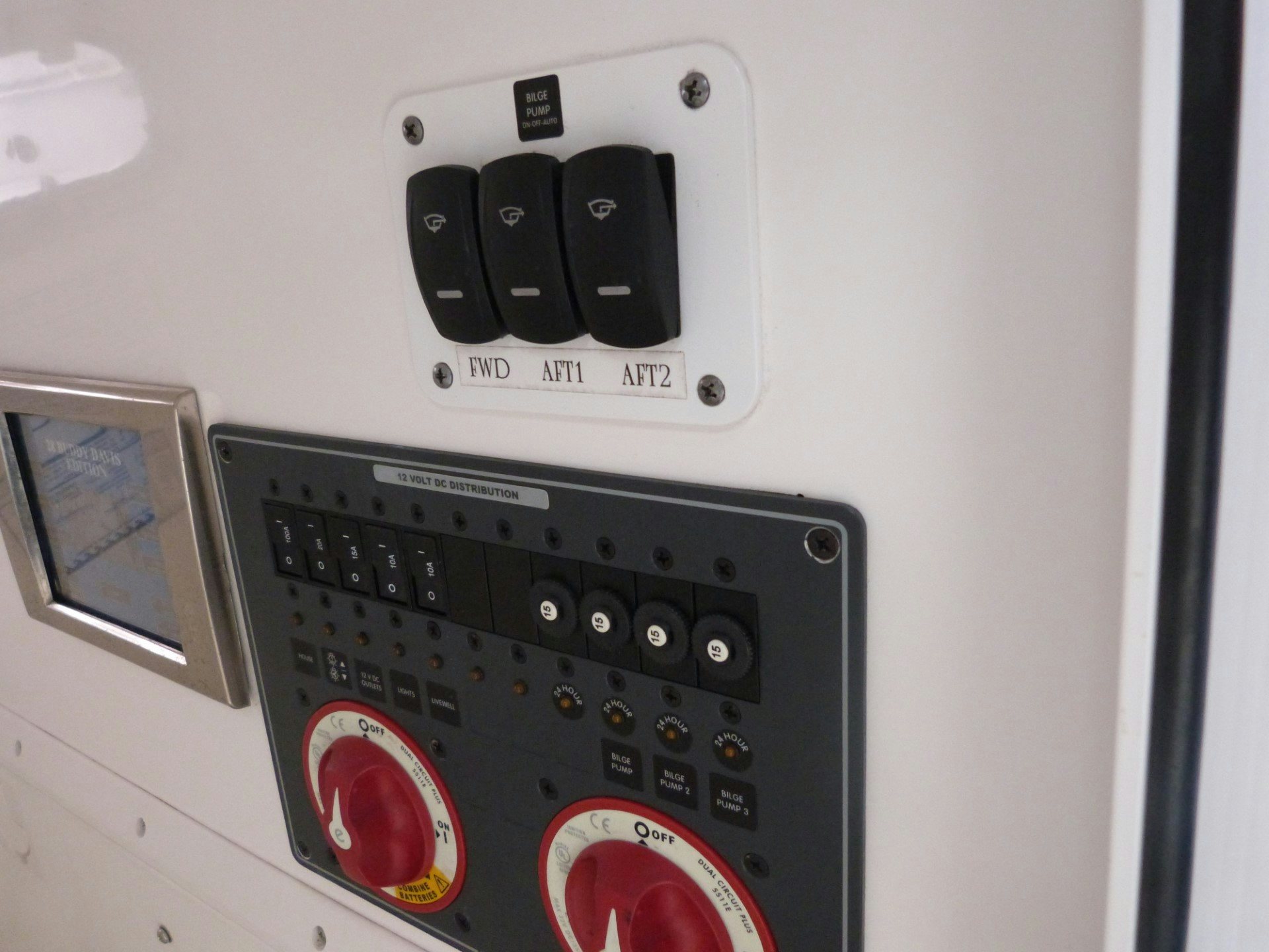 a white wall with a black rectangular object and a black rectangular object aboard T/t sally jo Yacht for Sale