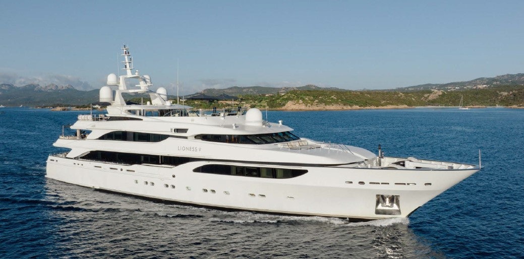 a white yacht on the water aboard LIONESS V Yacht for Sale