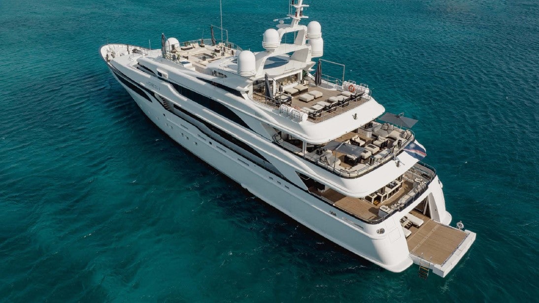 a large ship in the water aboard LIONESS V Yacht for Sale
