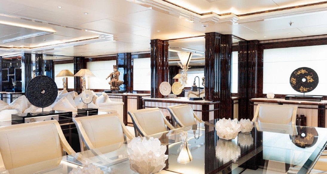 a room with a large window aboard LIONESS V Yacht for Sale