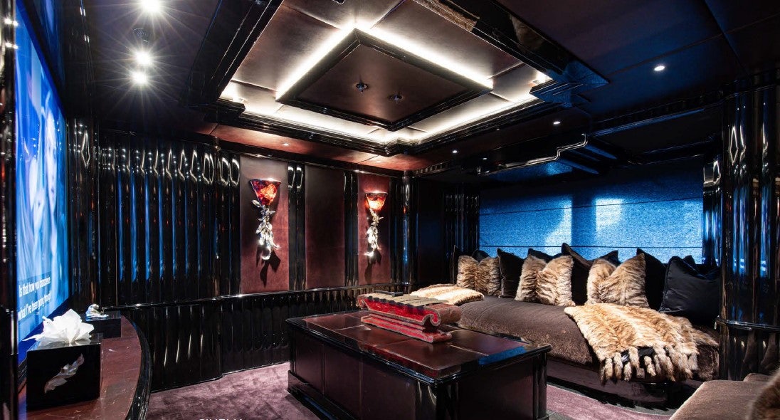 a room with a couch and a table aboard LIONESS V Yacht for Sale