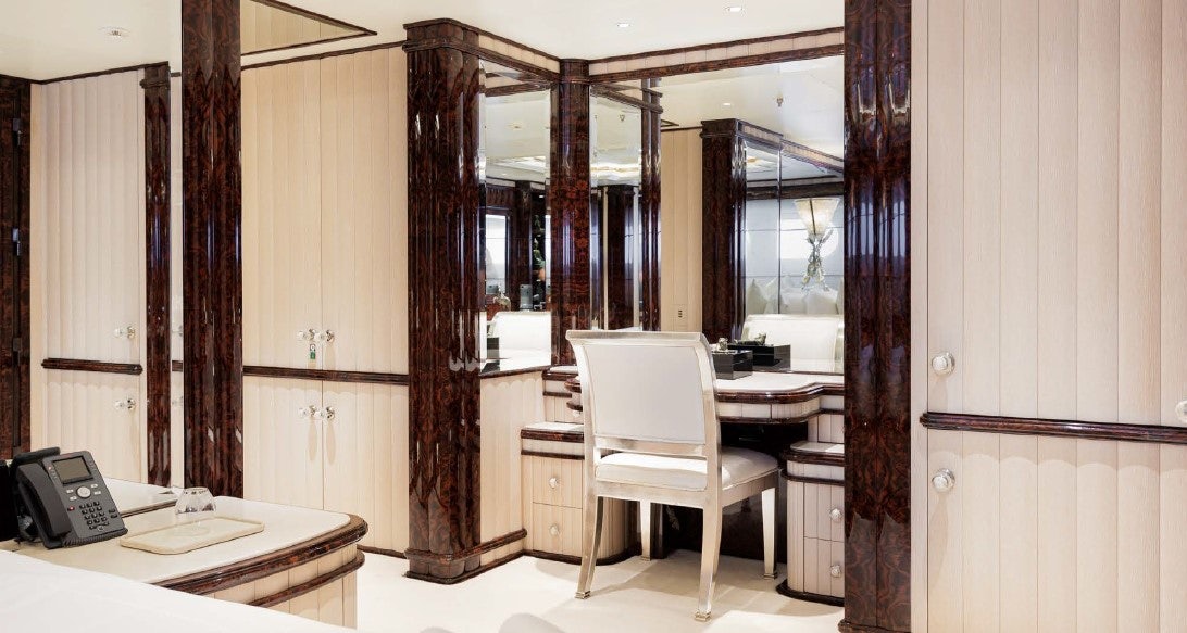 a room with a desk and a chair aboard LIONESS V Yacht for Sale