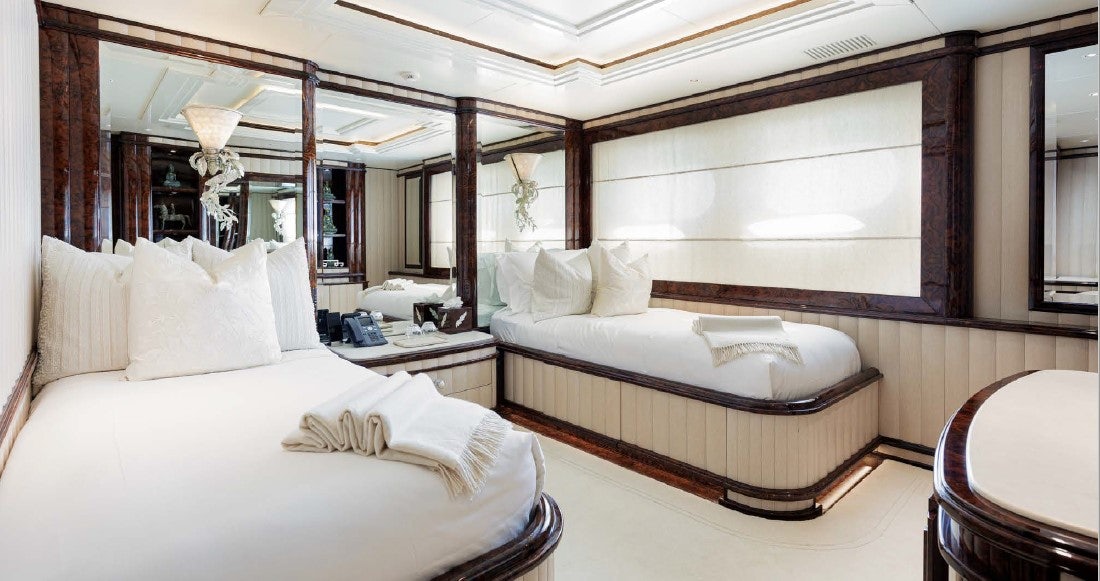 a room with two beds aboard LIONESS V Yacht for Sale