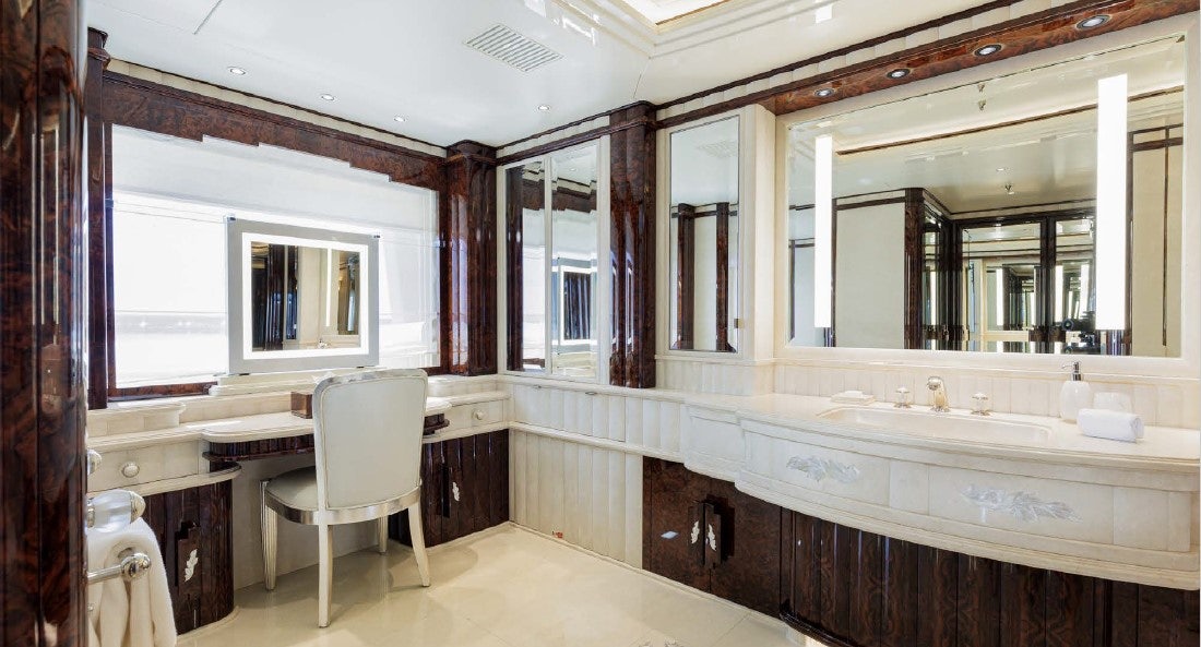 a bathroom with a large mirror aboard LIONESS V Yacht for Sale