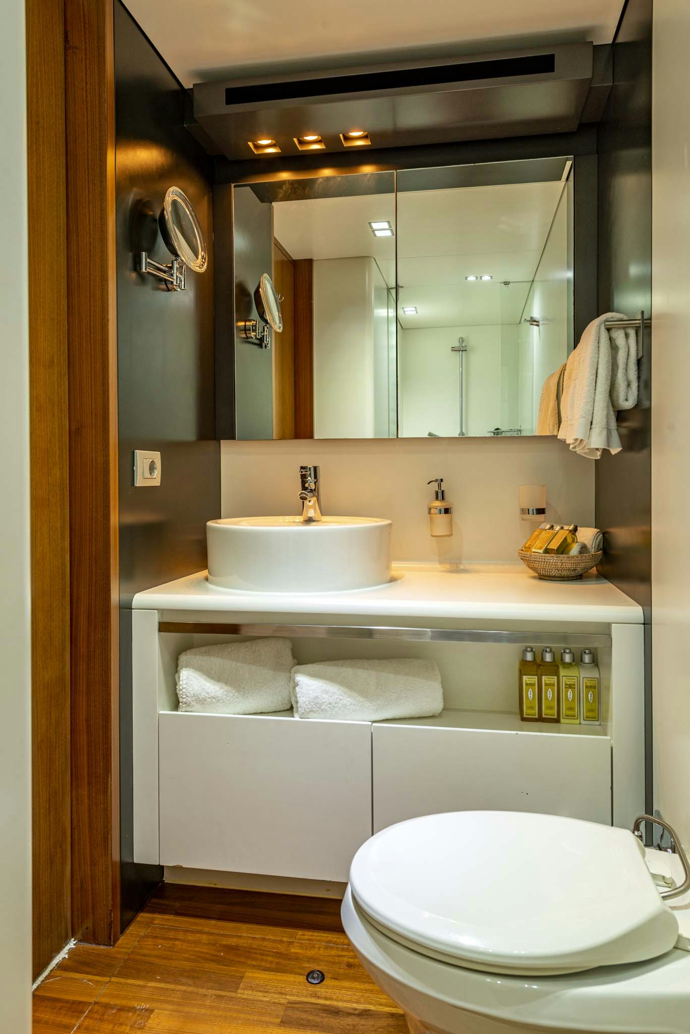 a bathroom with a sink and a toilet aboard QUANTUM Yacht for Charter